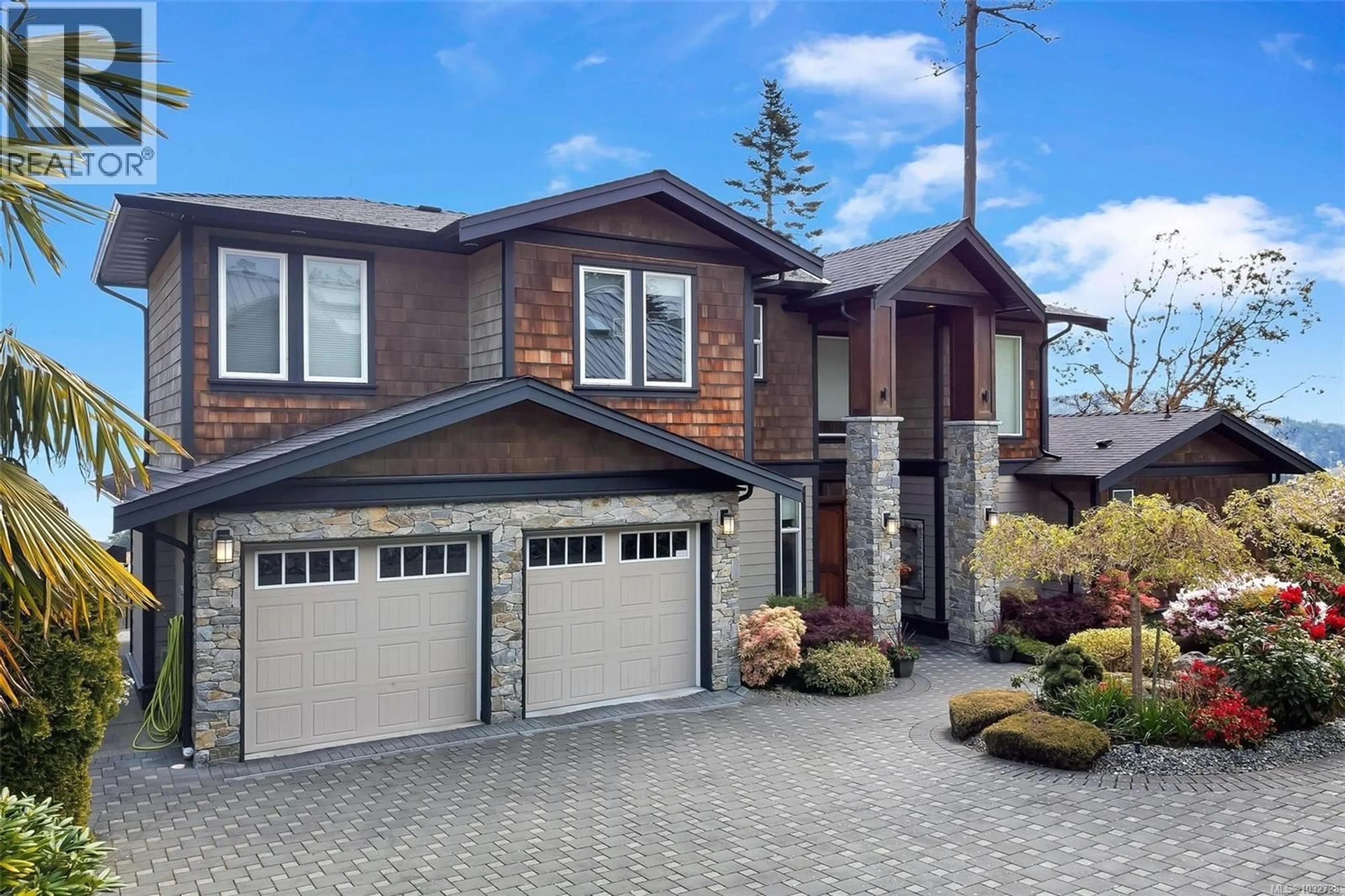 Home with brick exterior material, street for 943 SEA RIDGE LANE, Saanich British Columbia V8Y3K6
