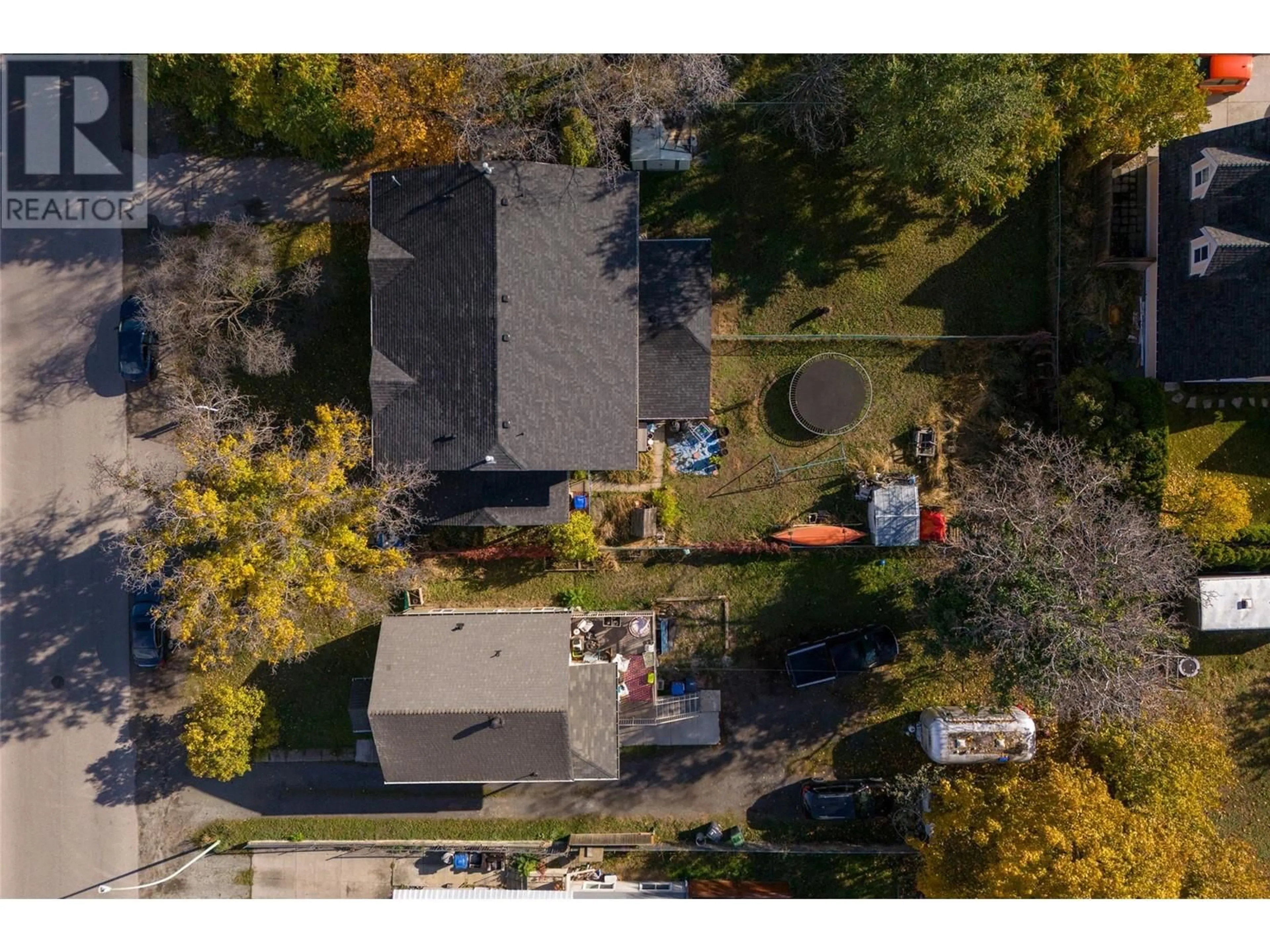 Frontside or backside of a home, the street view for 1025 & 1033/1035 Laurier Avenue, Kelowna British Columbia V1Y6B2