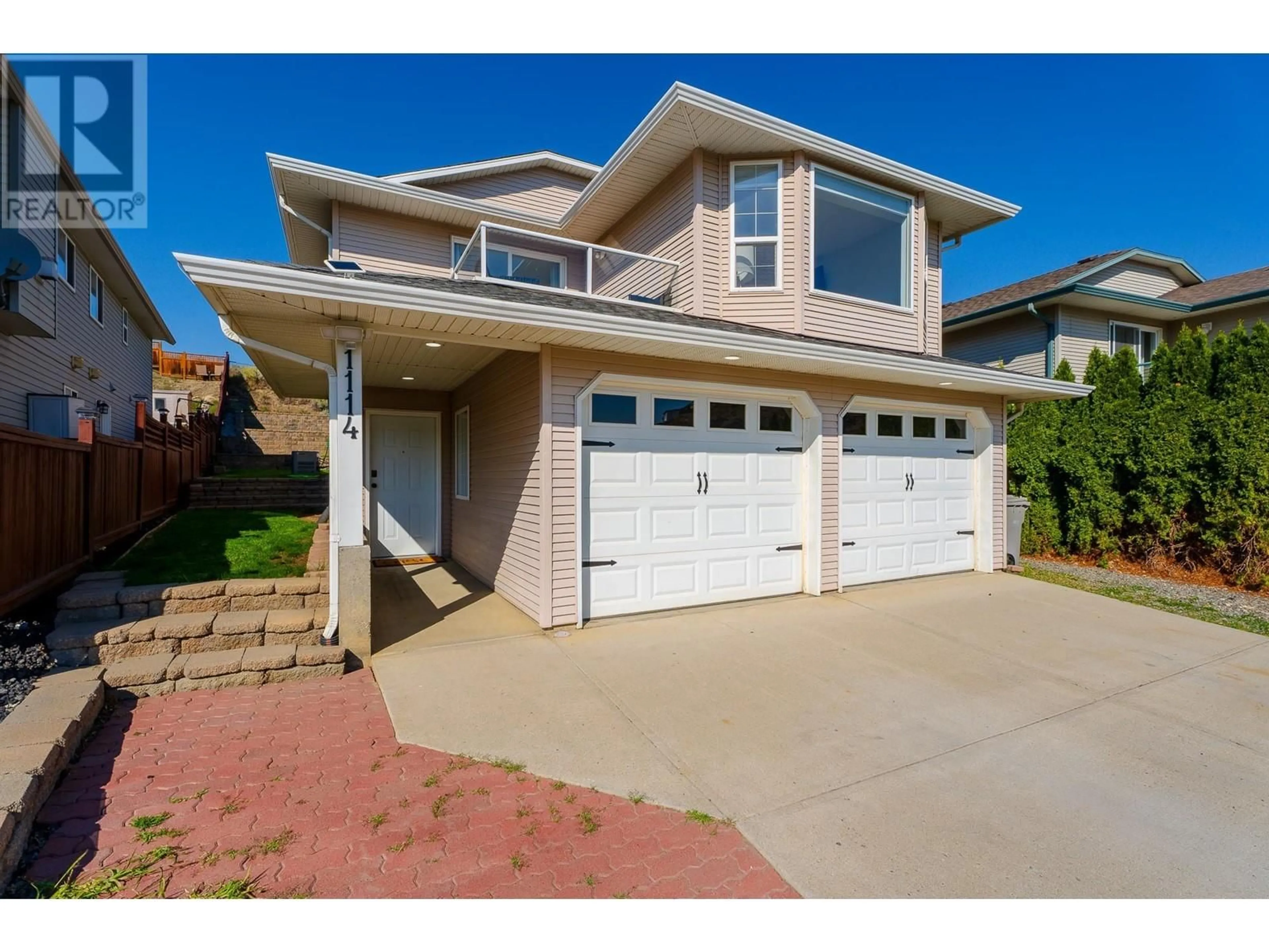 Frontside or backside of a home, the street view for 1114 RAVEN Drive, Kamloops British Columbia V2H1T7