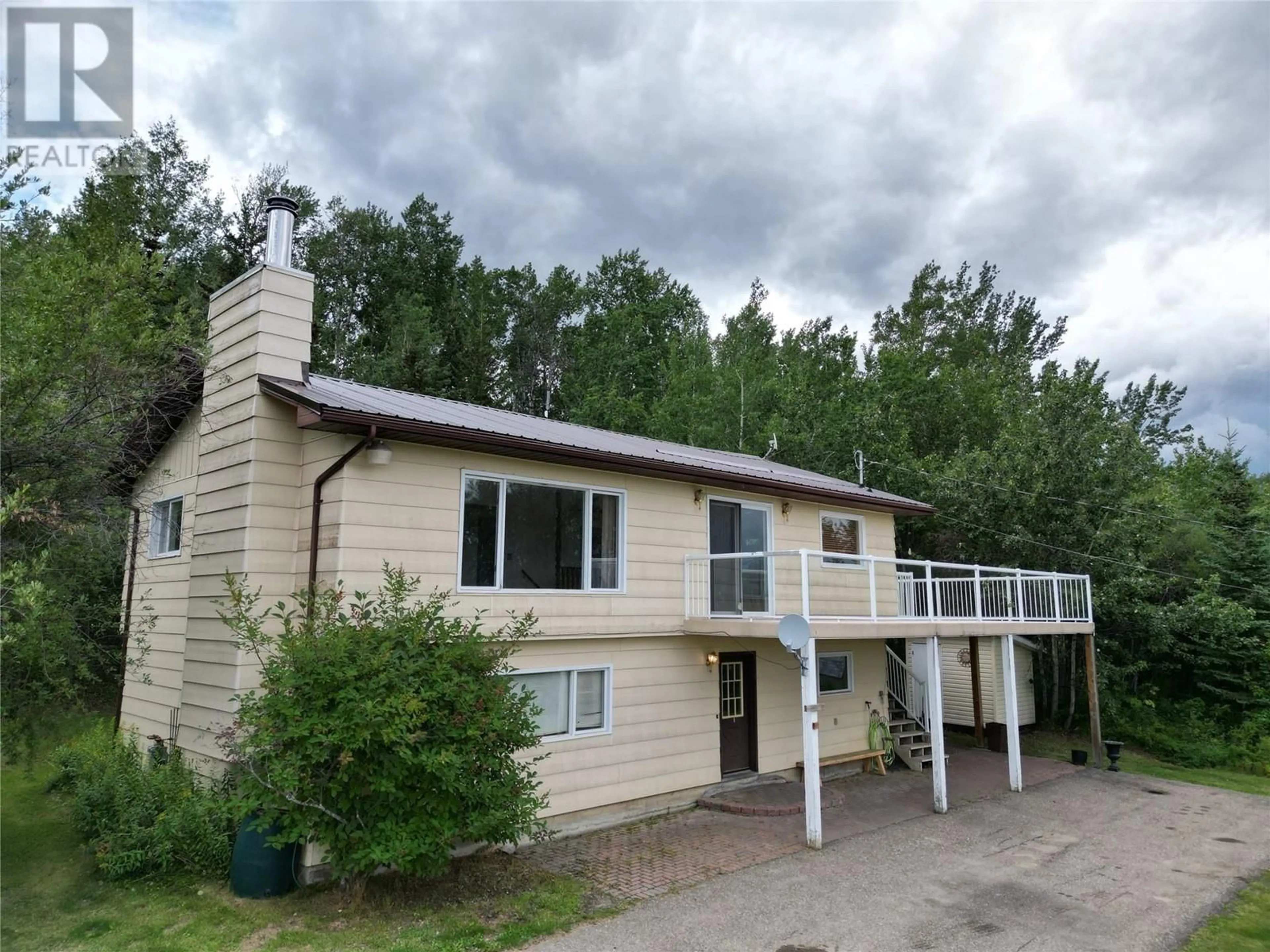 A pic from exterior of the house or condo, cottage for 13357 Trail Way, Dawson Creek British Columbia V1G0C2