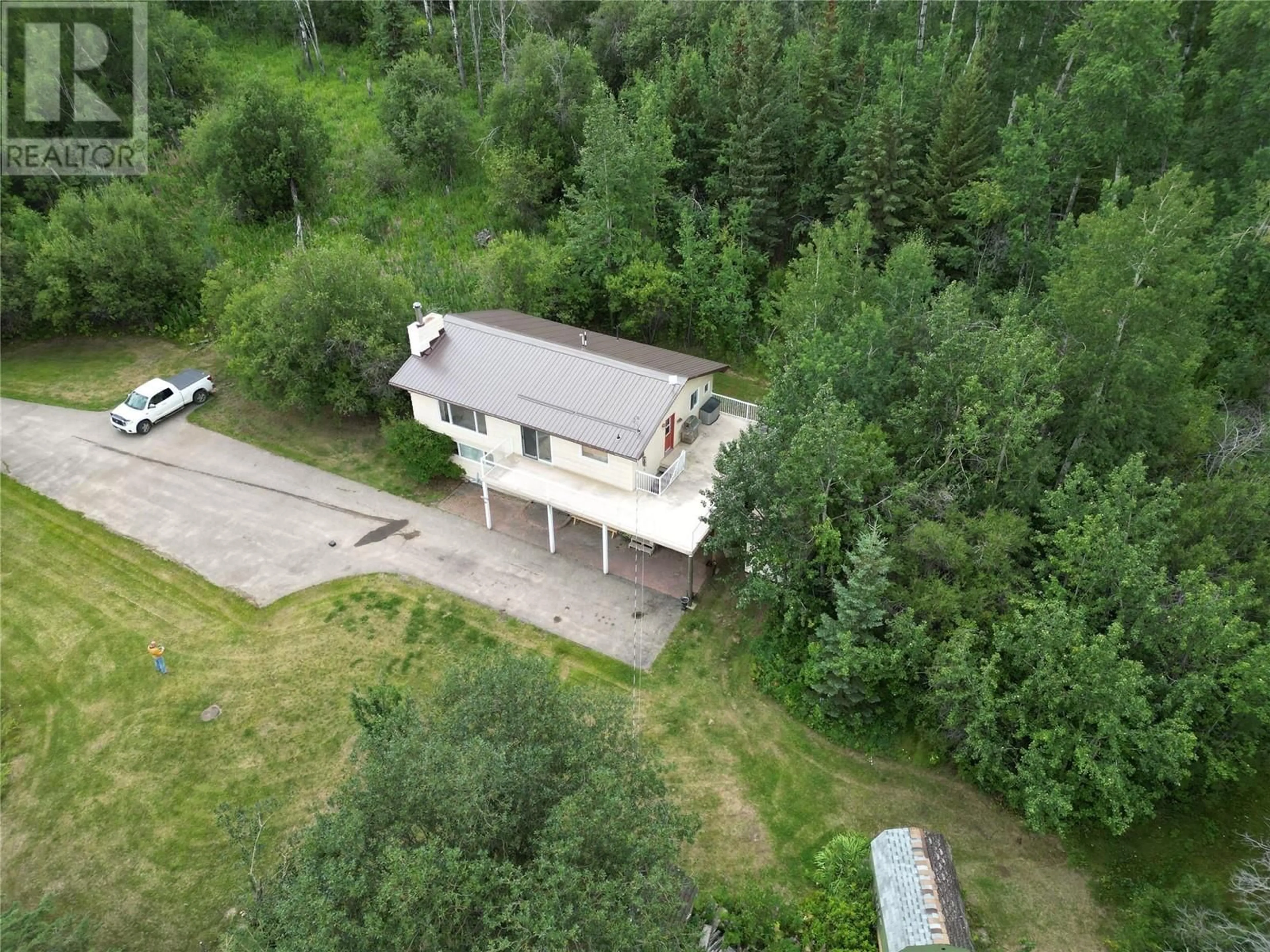 Frontside or backside of a home, cottage for 13357 Trail Way, Dawson Creek British Columbia V1G0C2