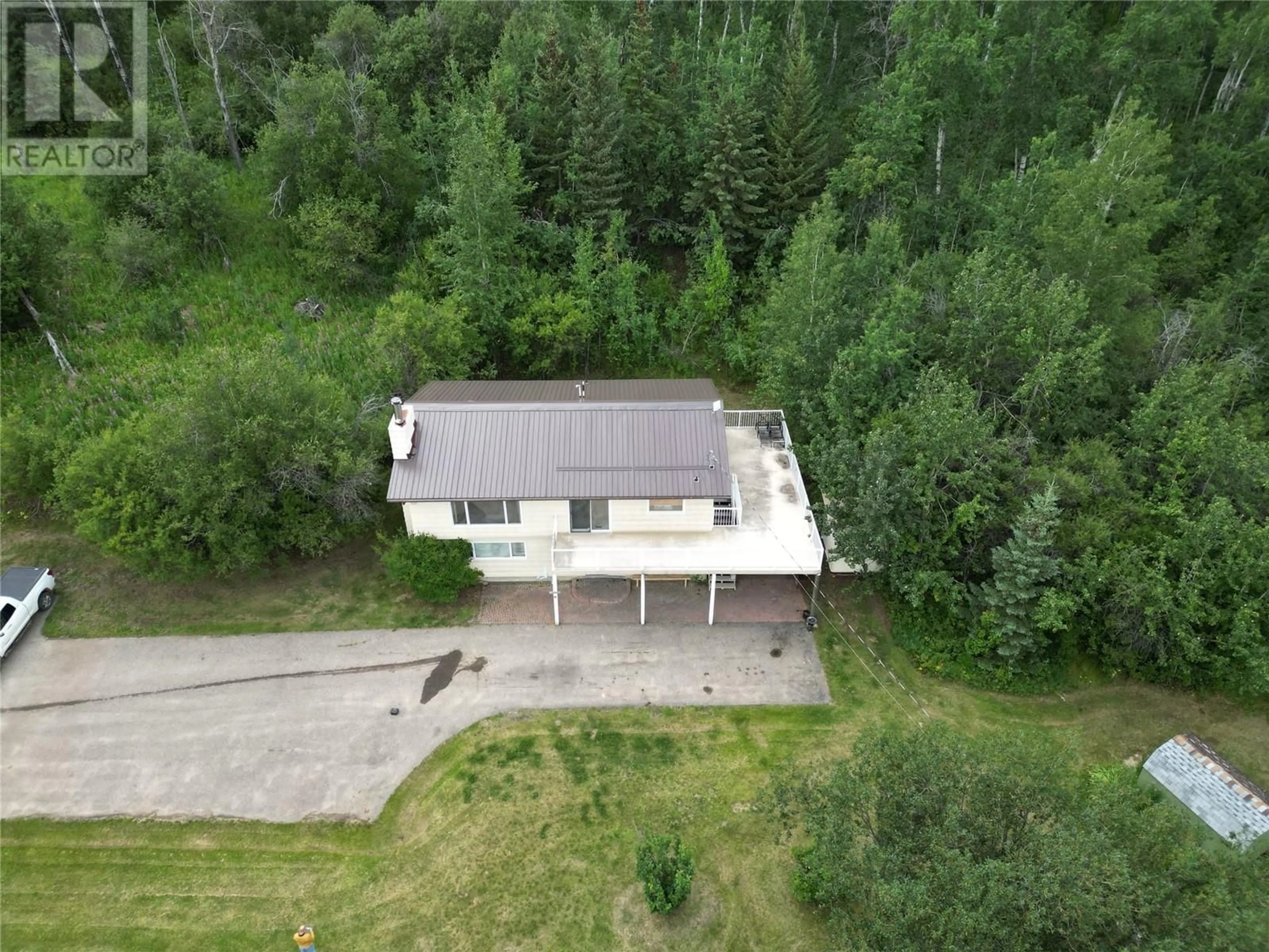 Frontside or backside of a home, cottage for 13357 Trail Way, Dawson Creek British Columbia V1G0C2