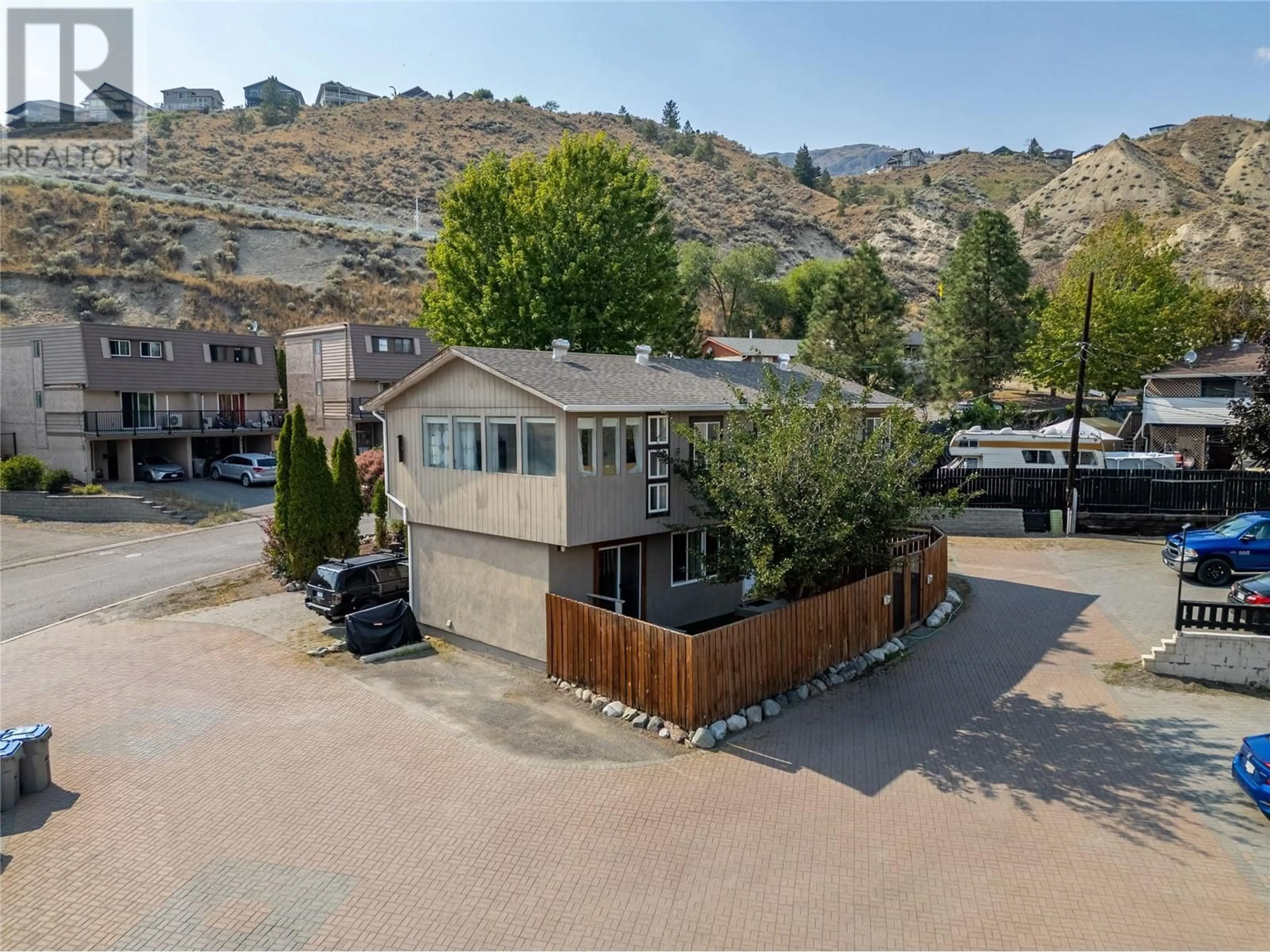 A pic from exterior of the house or condo, the street view for 870 MCQUEEN Drive Unit# 114, Kamloops British Columbia V2B7X9