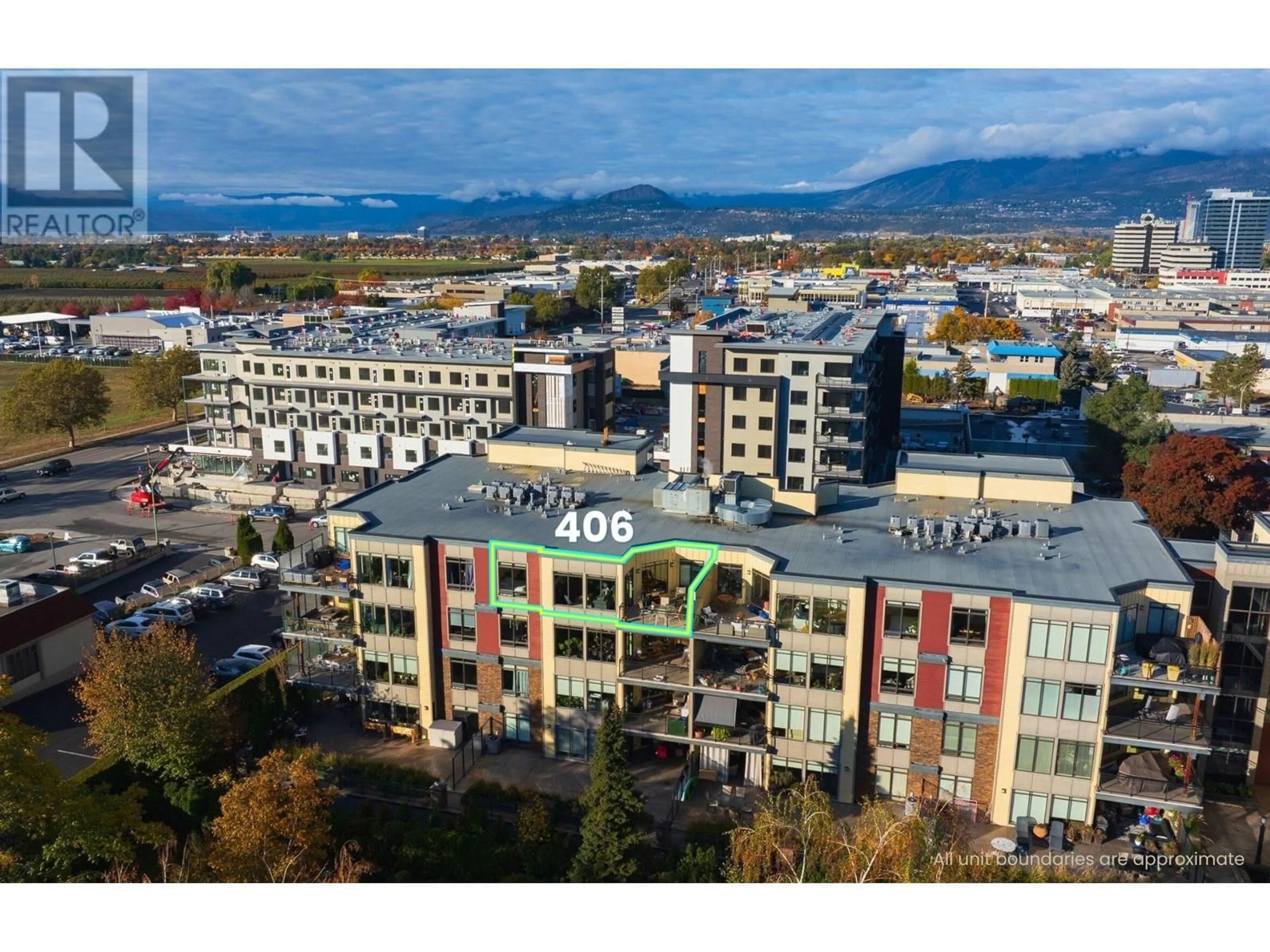 A pic from exterior of the house or condo, the view of city buildings for 1933 Ambrosi Road Unit# 406, Kelowna British Columbia V1Y4S1