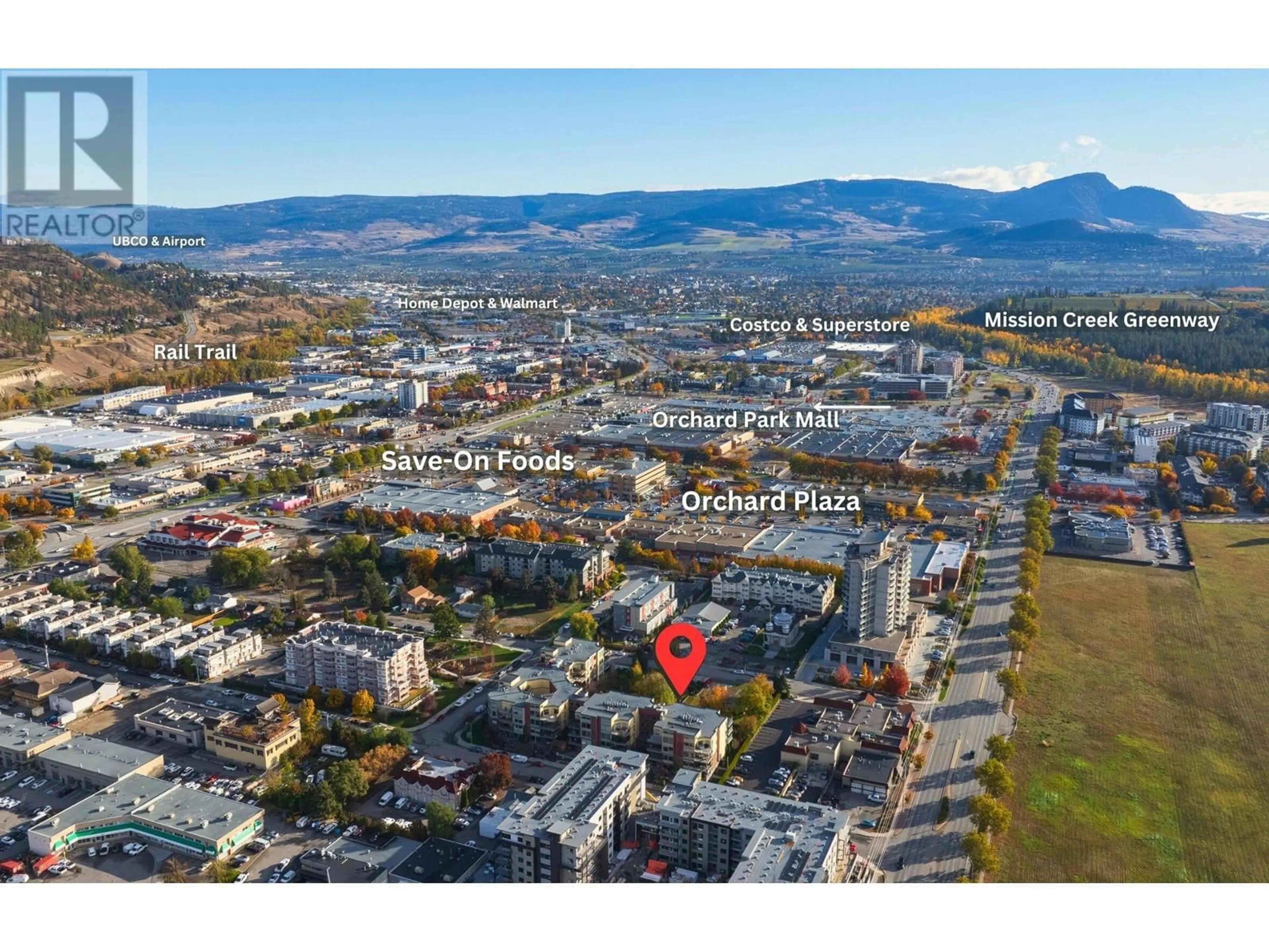 A pic from exterior of the house or condo, the view of city buildings for 1933 Ambrosi Road Unit# 406, Kelowna British Columbia V1Y4S1