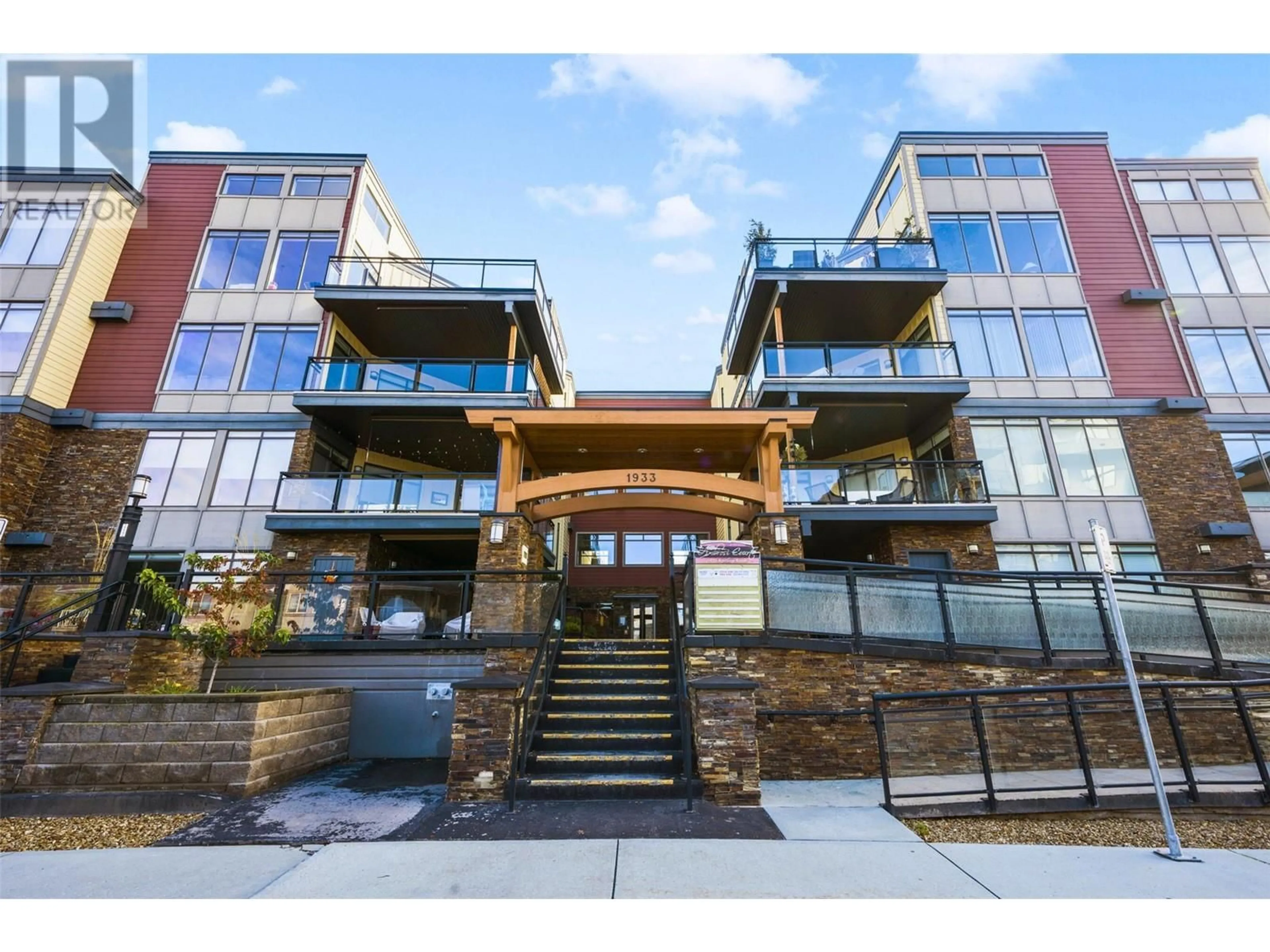 A pic from exterior of the house or condo, the front or back of building for 1933 Ambrosi Road Unit# 406, Kelowna British Columbia V1Y4S1