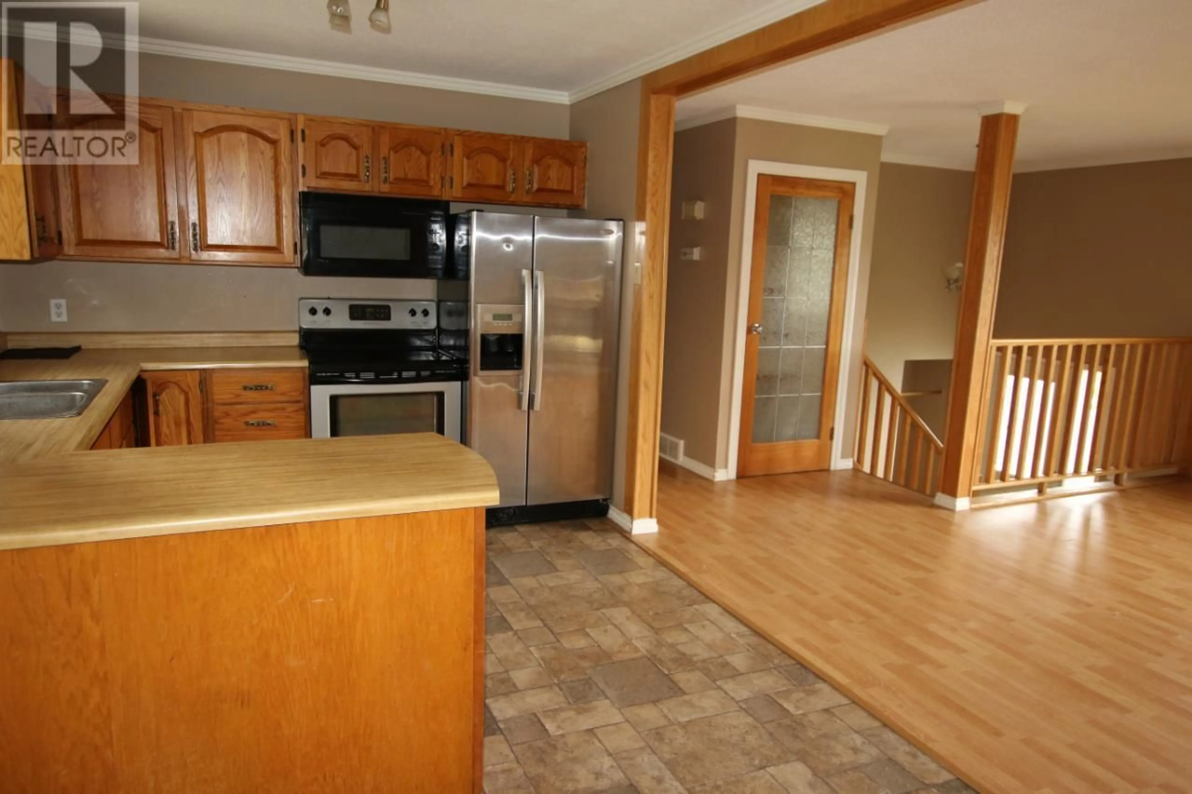 Kitchen, wood floors, cottage for 111 KISKATINAW Crescent, Tumbler Ridge British Columbia V0C2W0