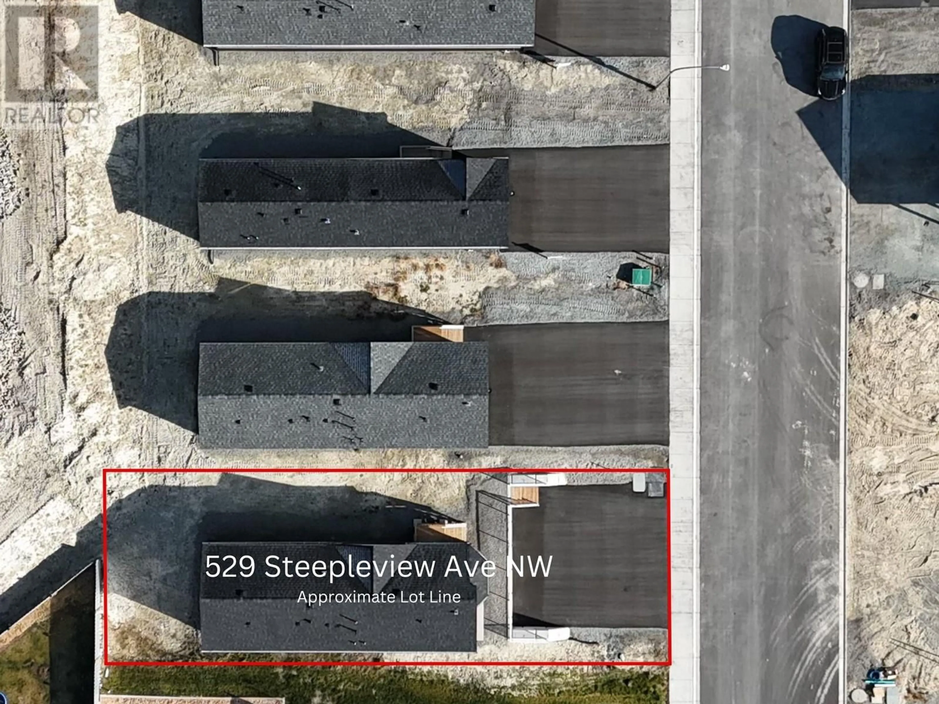 A pic from outside/outdoor area/front of a property/back of a property/a pic from drone, street for 529 STEEPLEVIEW AVENUE NORTHWEST, Cranbrook British Columbia V1C5L3