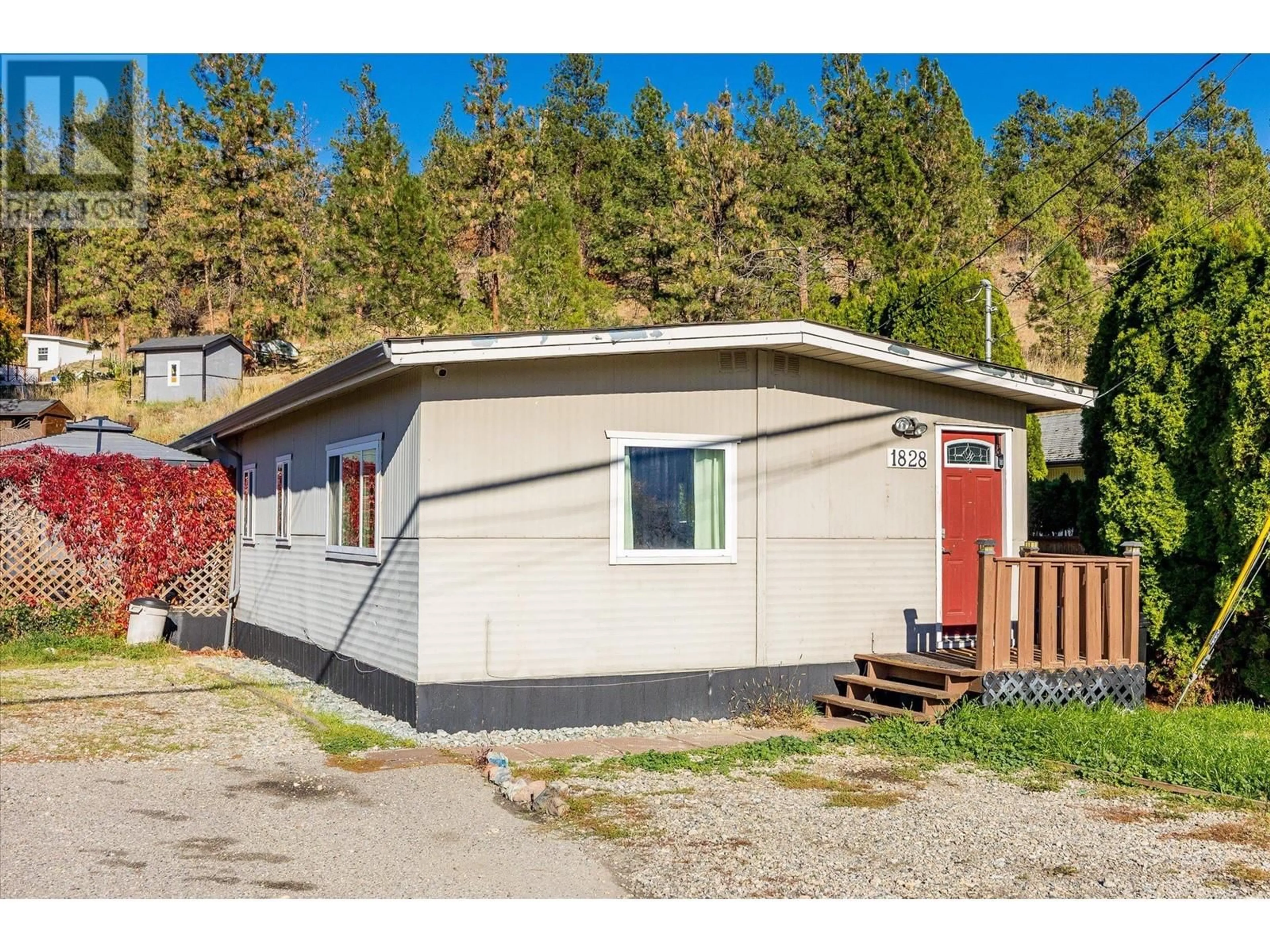 Home with vinyl exterior material, street for 1828 BOUCHERIE ROAD, Westbank British Columbia V4T2C8