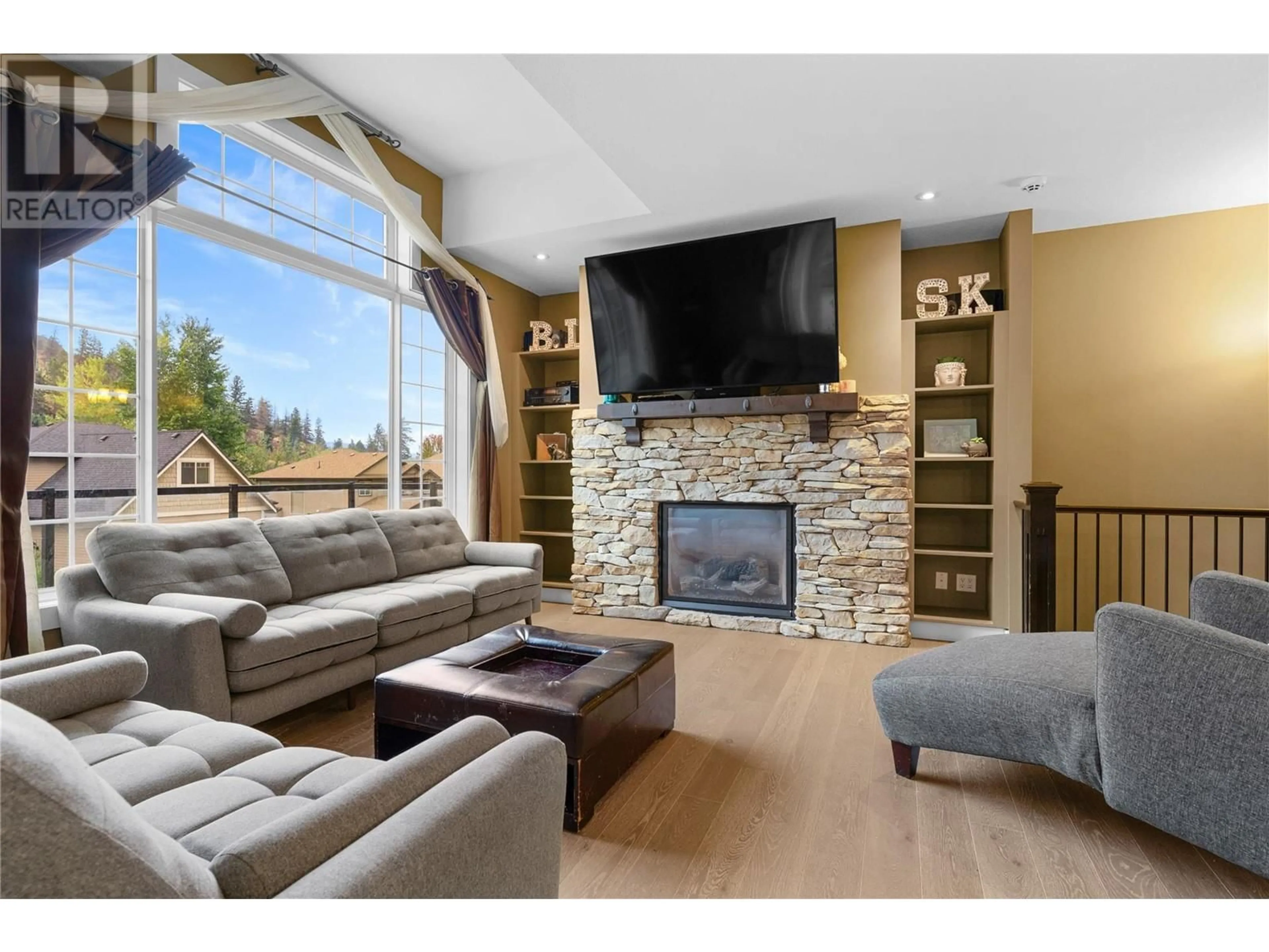 Living room, wood floors for 2160 Shelby Crescent, West Kelowna British Columbia V4T3B1