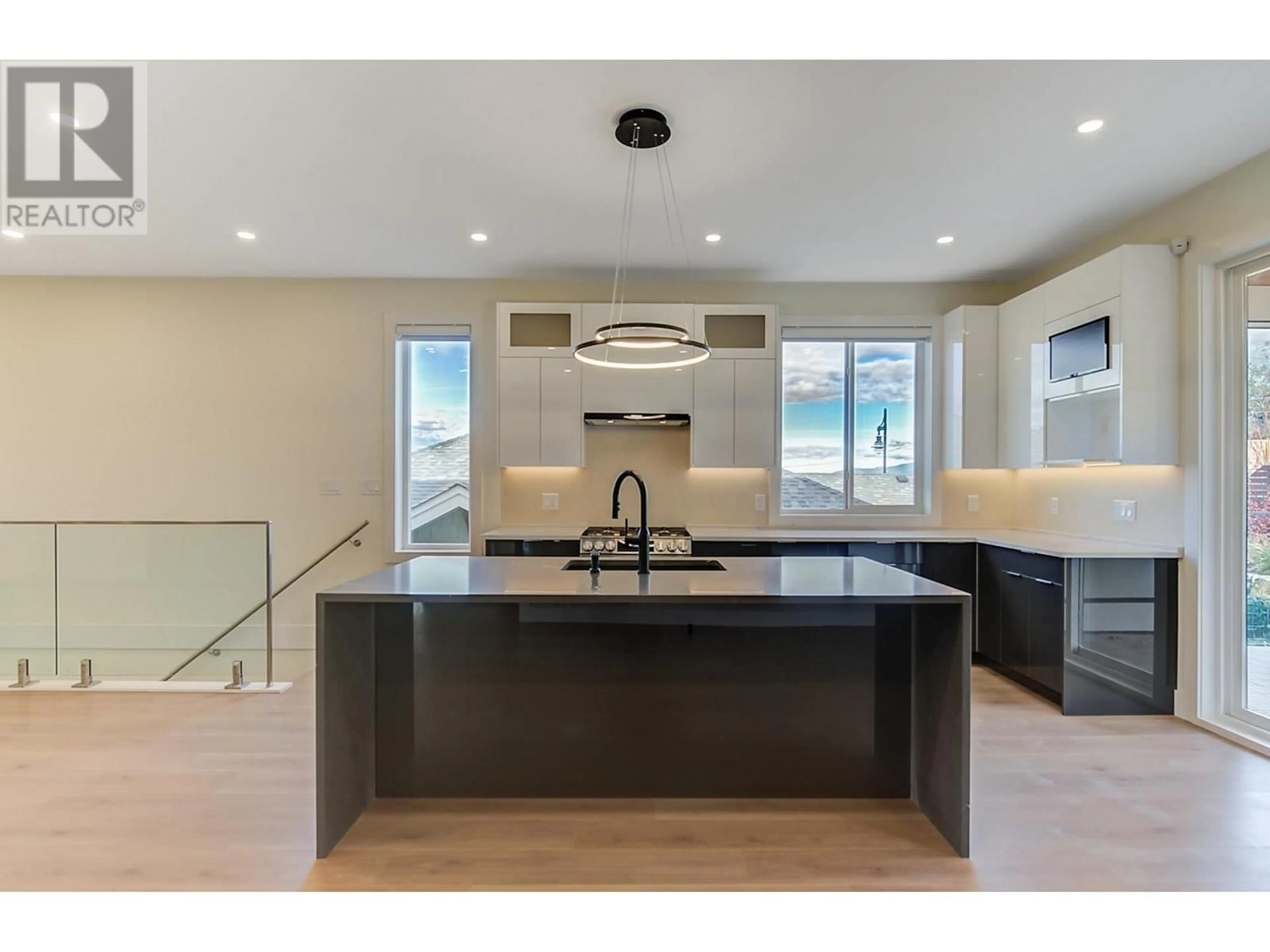 Open concept kitchen for 5084 Twinflower Crescent, Kelowna British Columbia V1W5L8