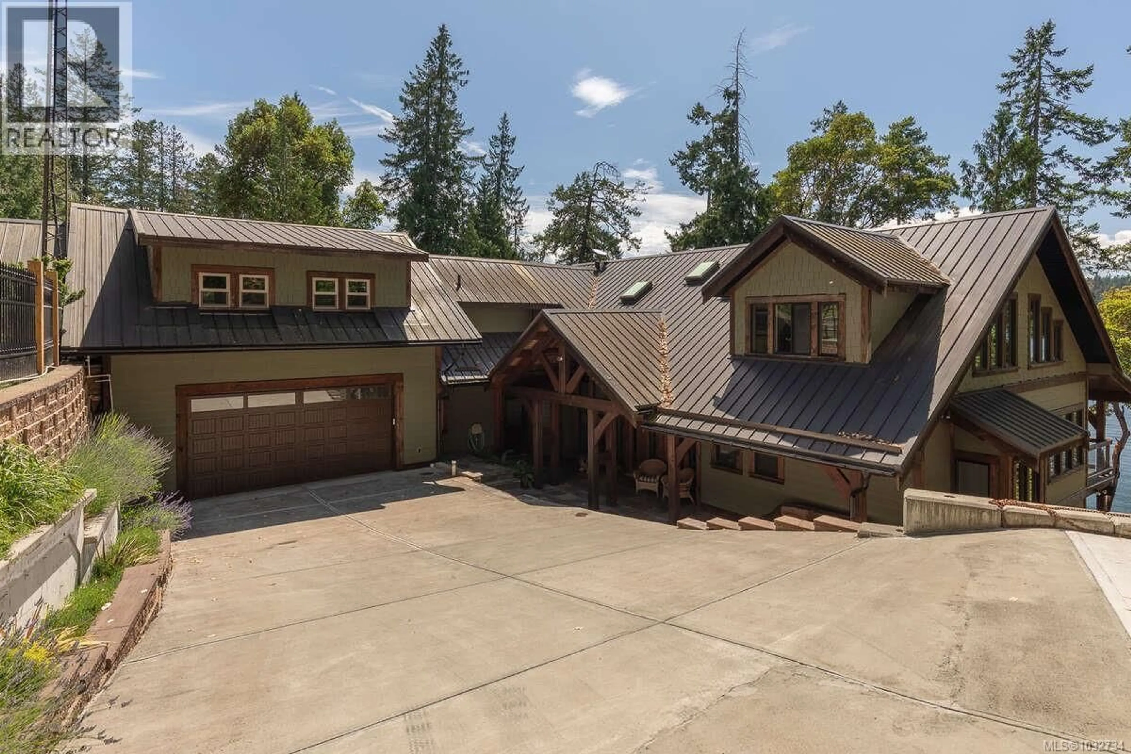 A pic from outside/outdoor area/front of a property/back of a property/a pic from drone, unknown for 123 SMITH ROAD, Salt Spring British Columbia V8K2W9