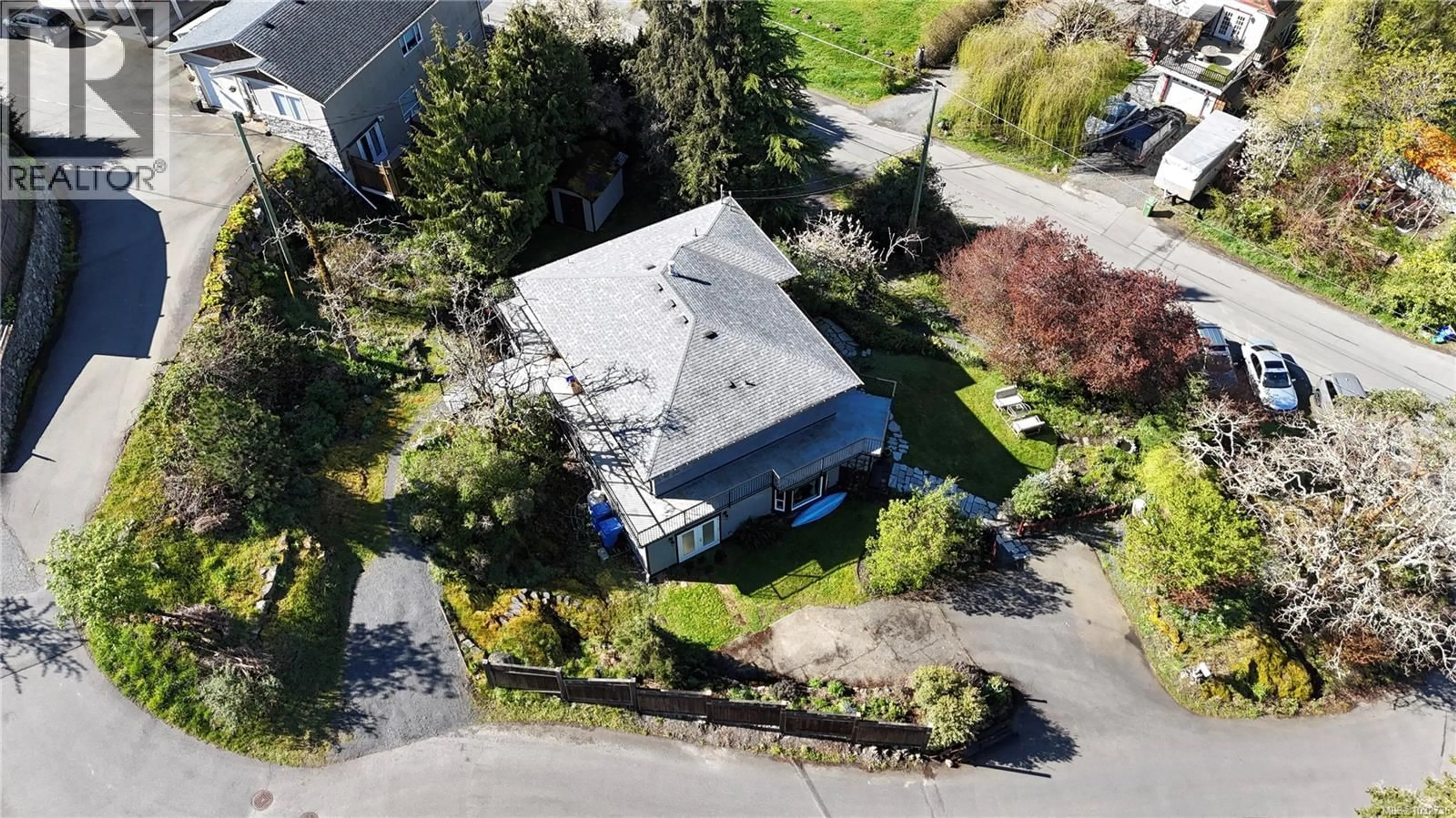 A pic from outside/outdoor area/front of a property/back of a property/a pic from drone, street for 660 ROCKINGHAM ROAD, Langford British Columbia V9B3N8