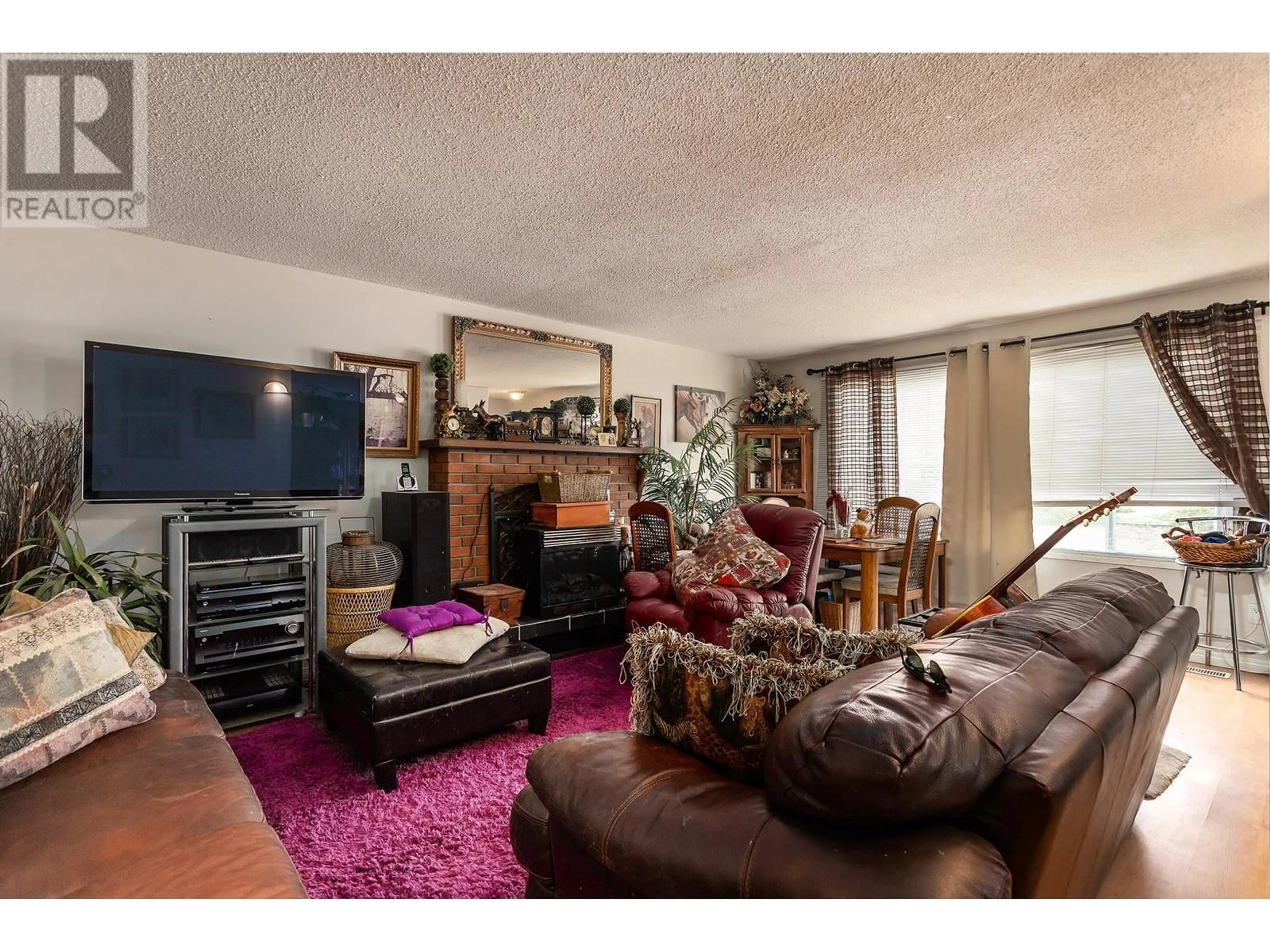 Living room, wood floors for 3343 McMorland Road, West Kelowna British Columbia V4T1B1