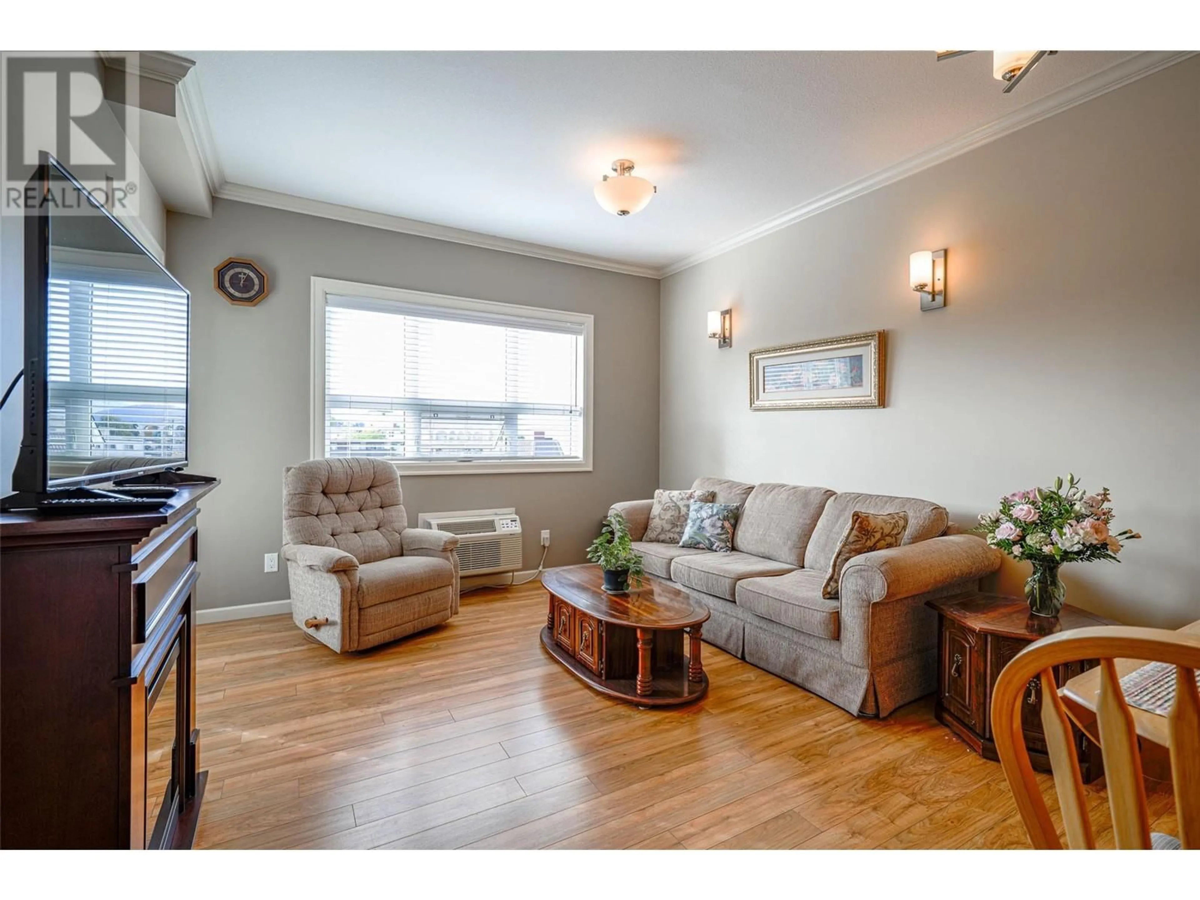 Living room, wood floors for 3010 35 Street Unit# 112, Vernon British Columbia V1T0A7