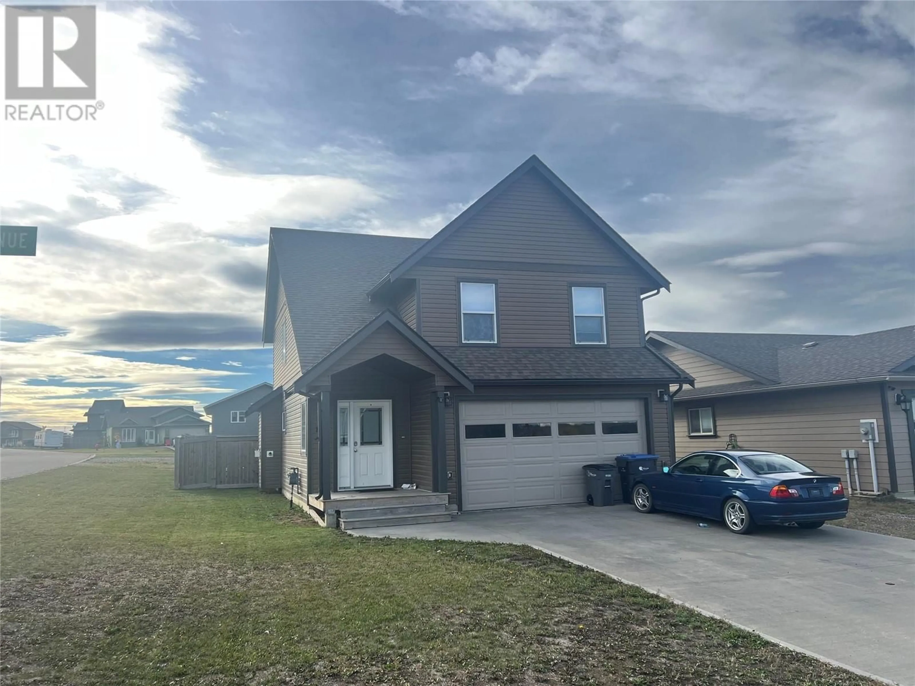 Frontside or backside of a home, the street view for 1801 83 Avenue, Dawson Creek British Columbia V1G0E2