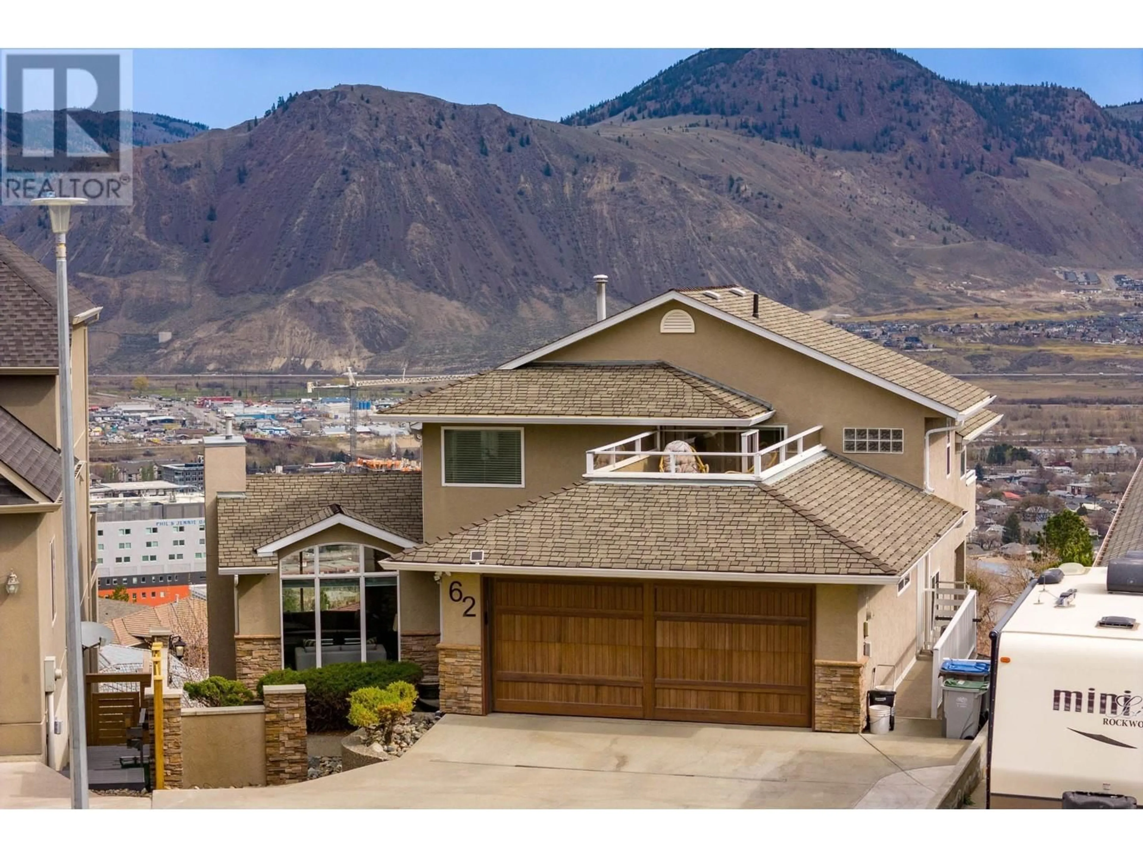 Frontside or backside of a home, the street view for 62 ARROWSTONE Drive, Kamloops British Columbia V2C6P9