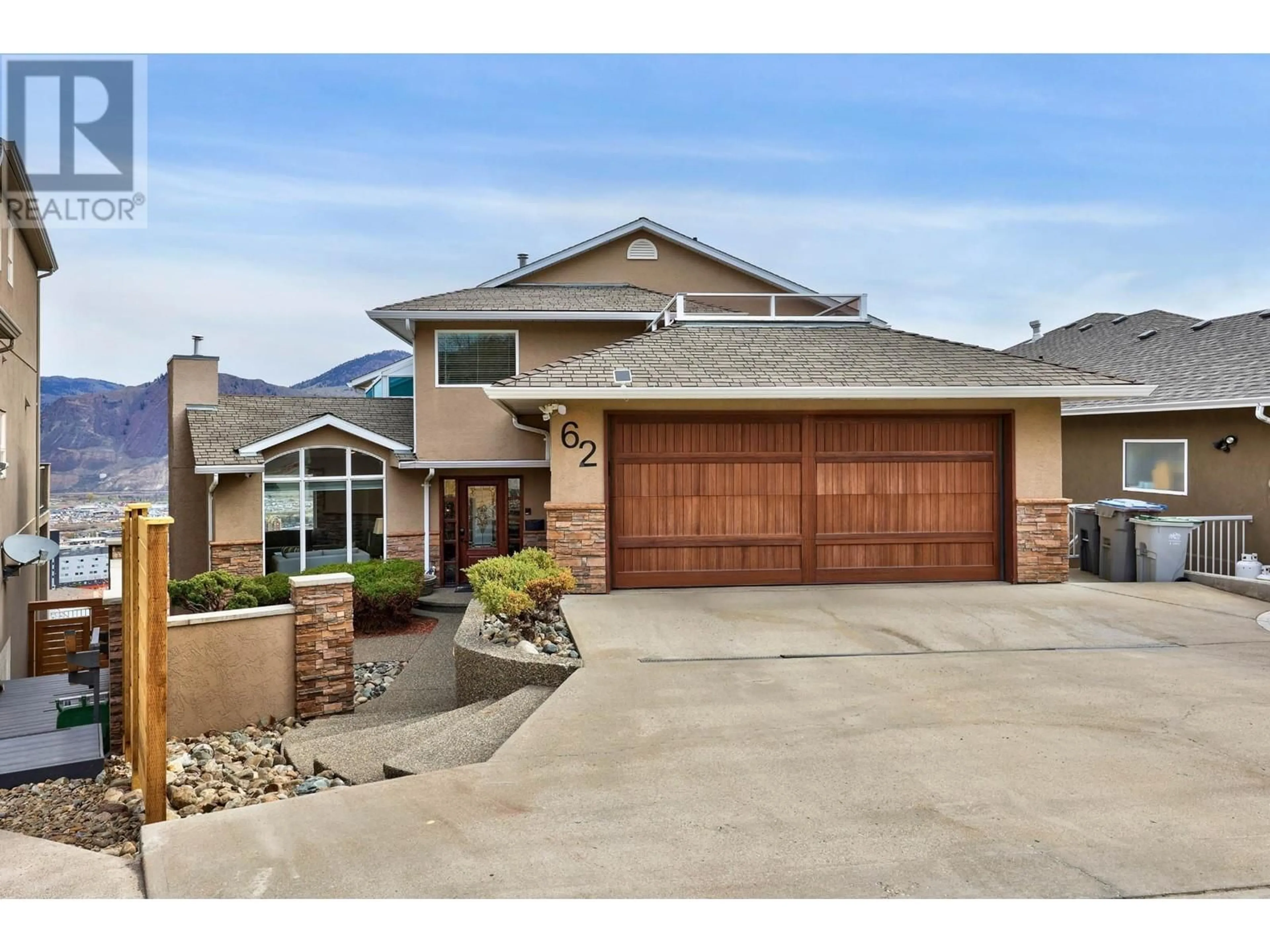 Frontside or backside of a home, the street view for 62 ARROWSTONE Drive, Kamloops British Columbia V2C6P9