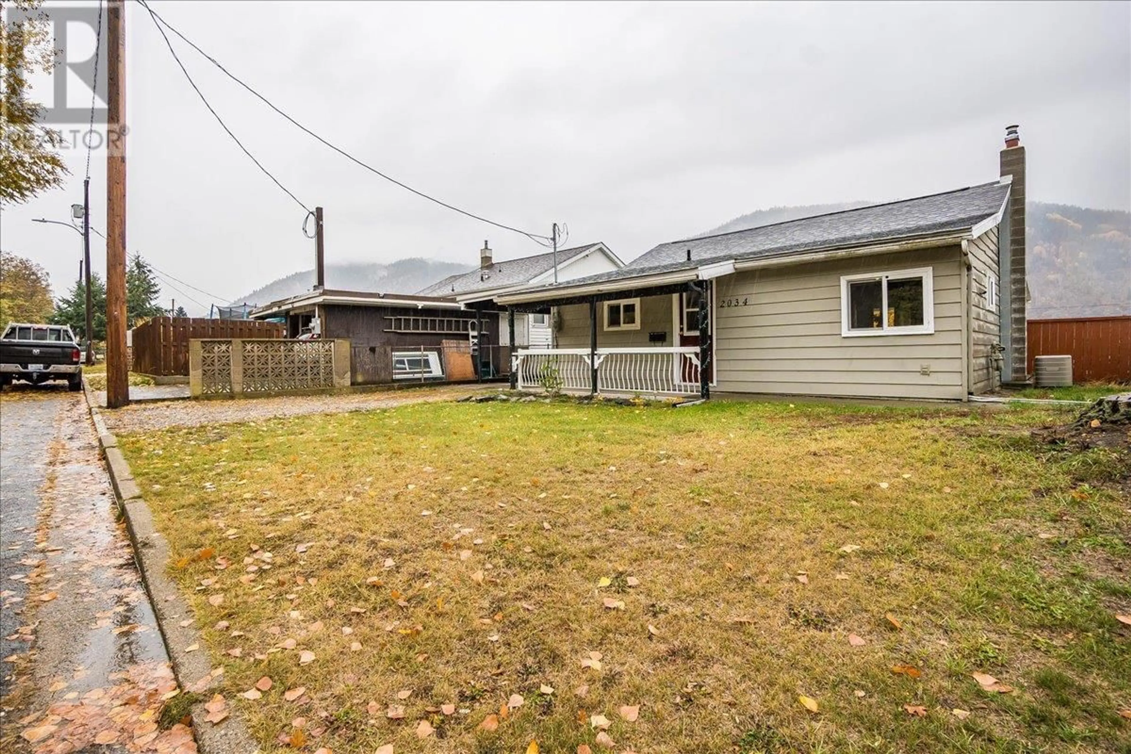 Patio, the fenced backyard for 2034 Eighth Avenue, Trail British Columbia V1R3E1