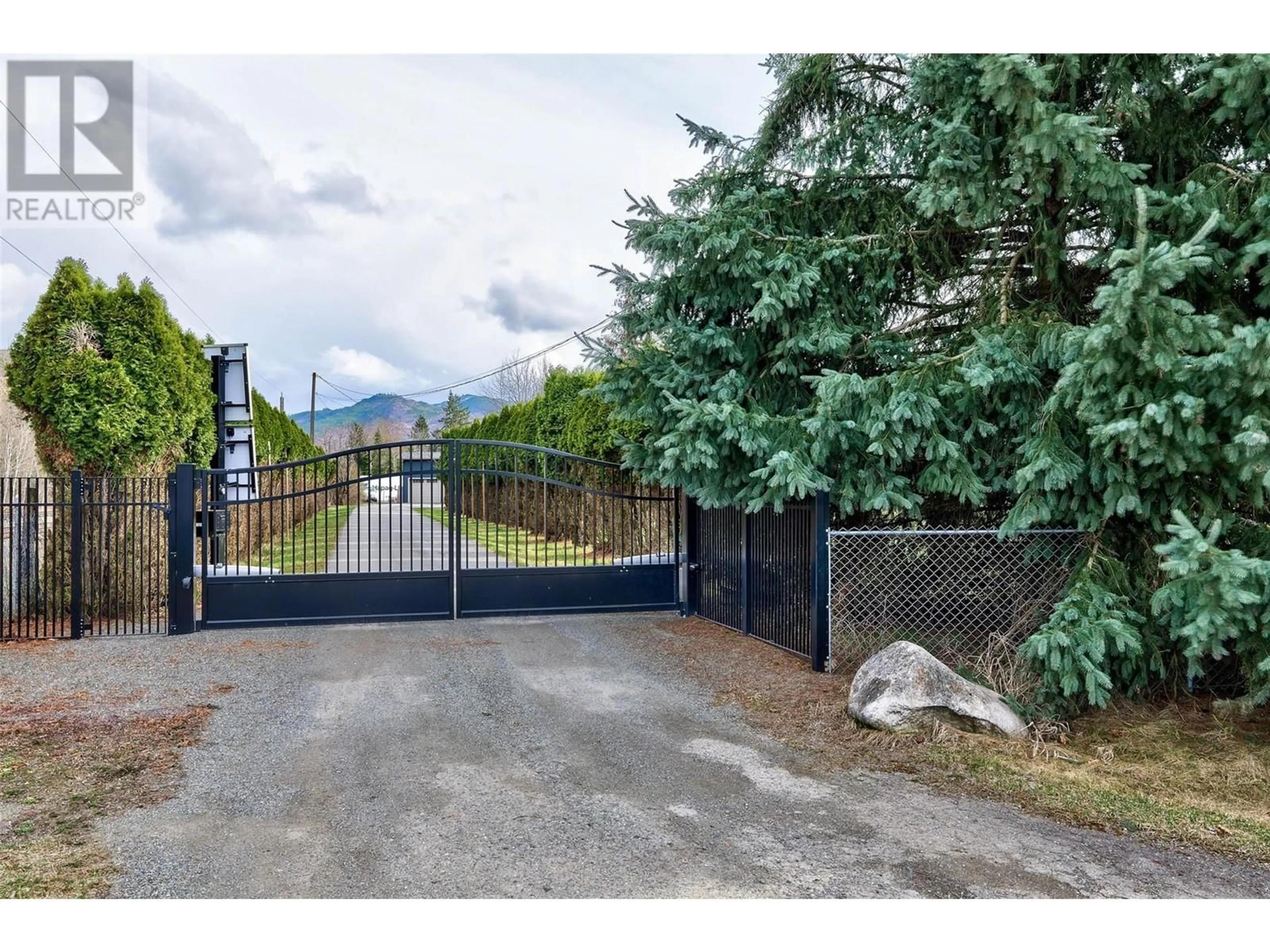 Frontside or backside of a home, the fenced backyard for 366 Staines Road, Barriere British Columbia V0E1E0