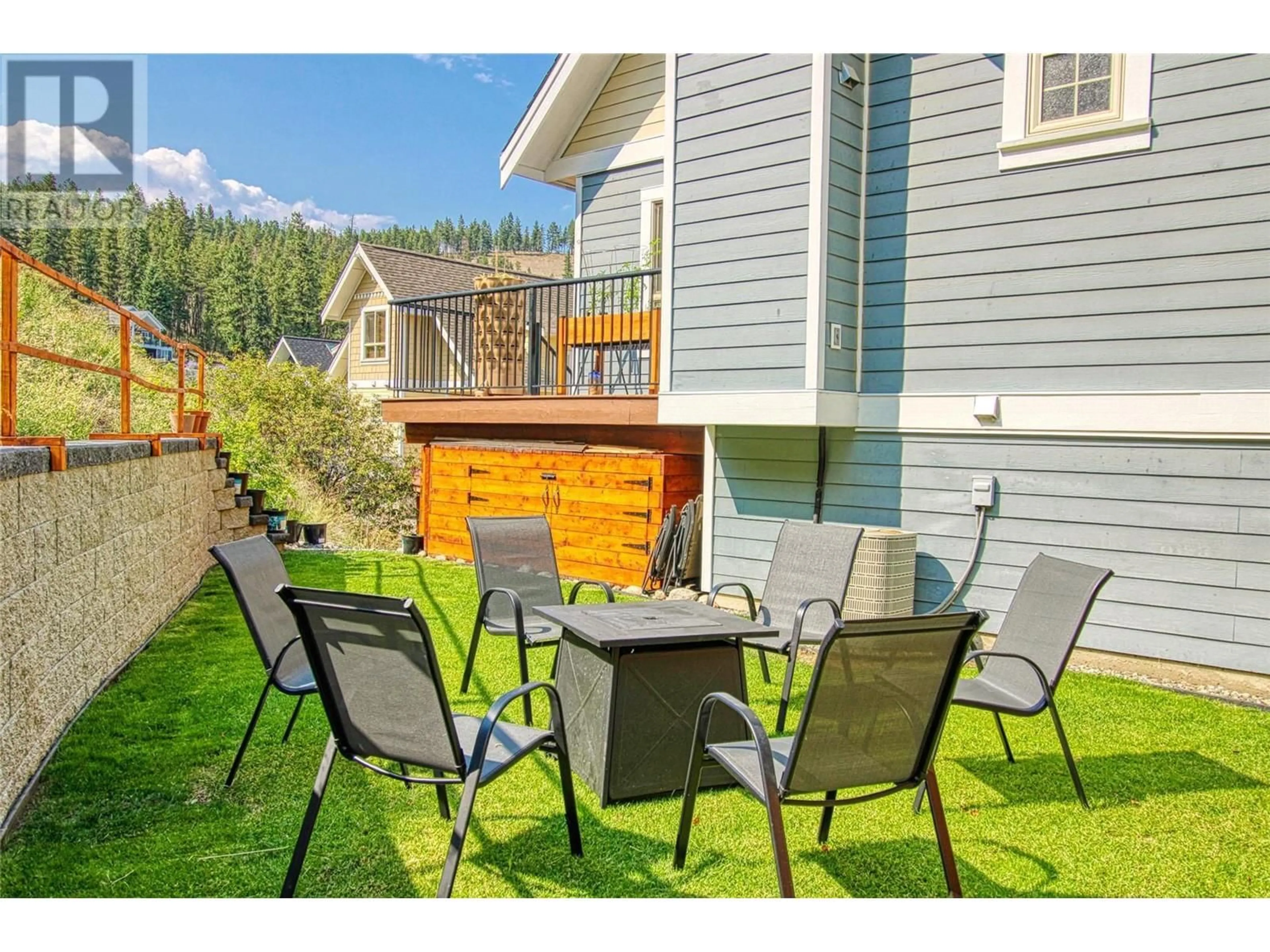 Patio, the fenced backyard for 6838 Santiago Loop Unit# 176, Kelowna British Columbia V1Z3R8