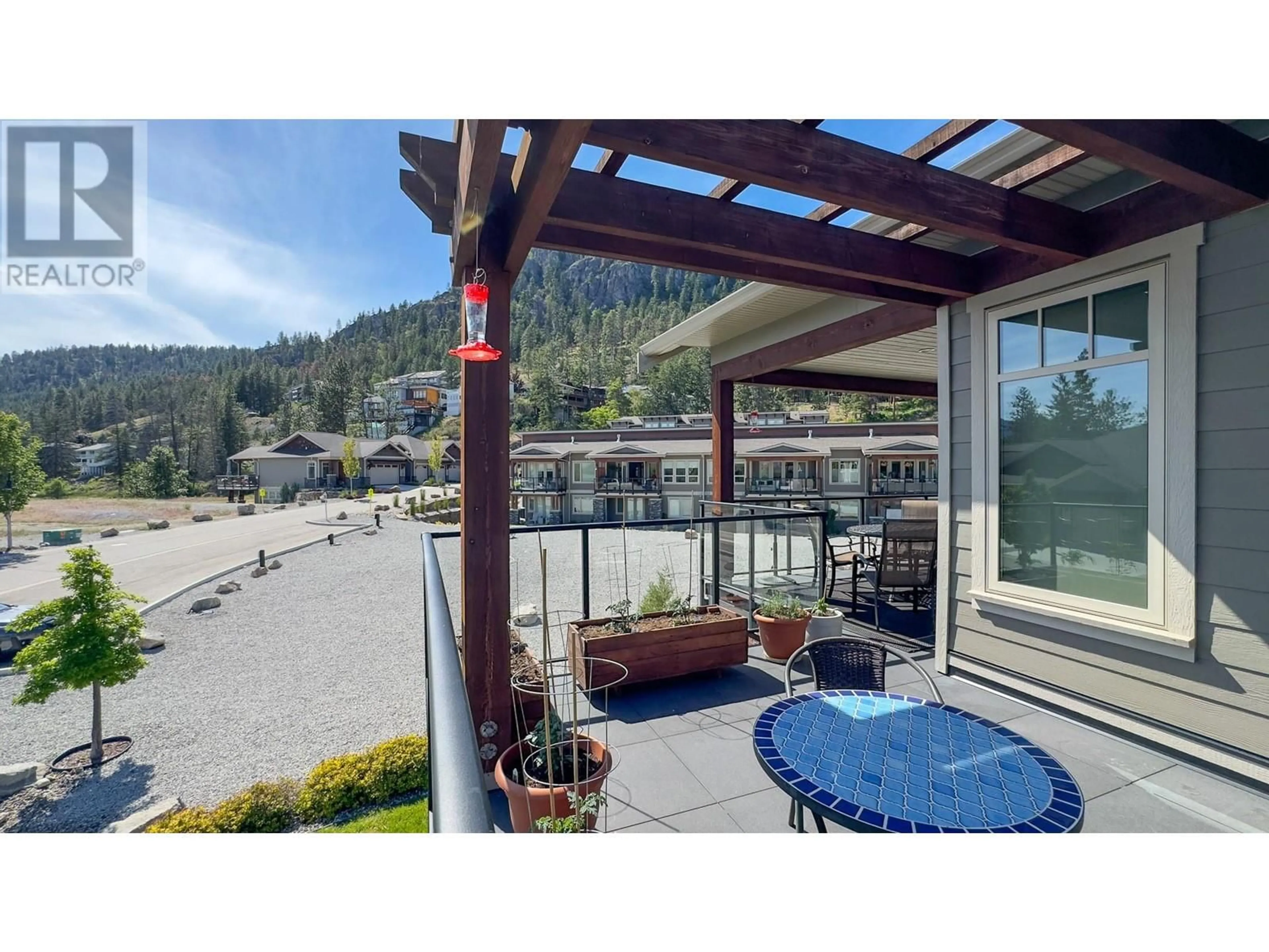 Patio, the street view for 4000 Redstone Crescent Unit# 203, Peachland British Columbia V0H1X5