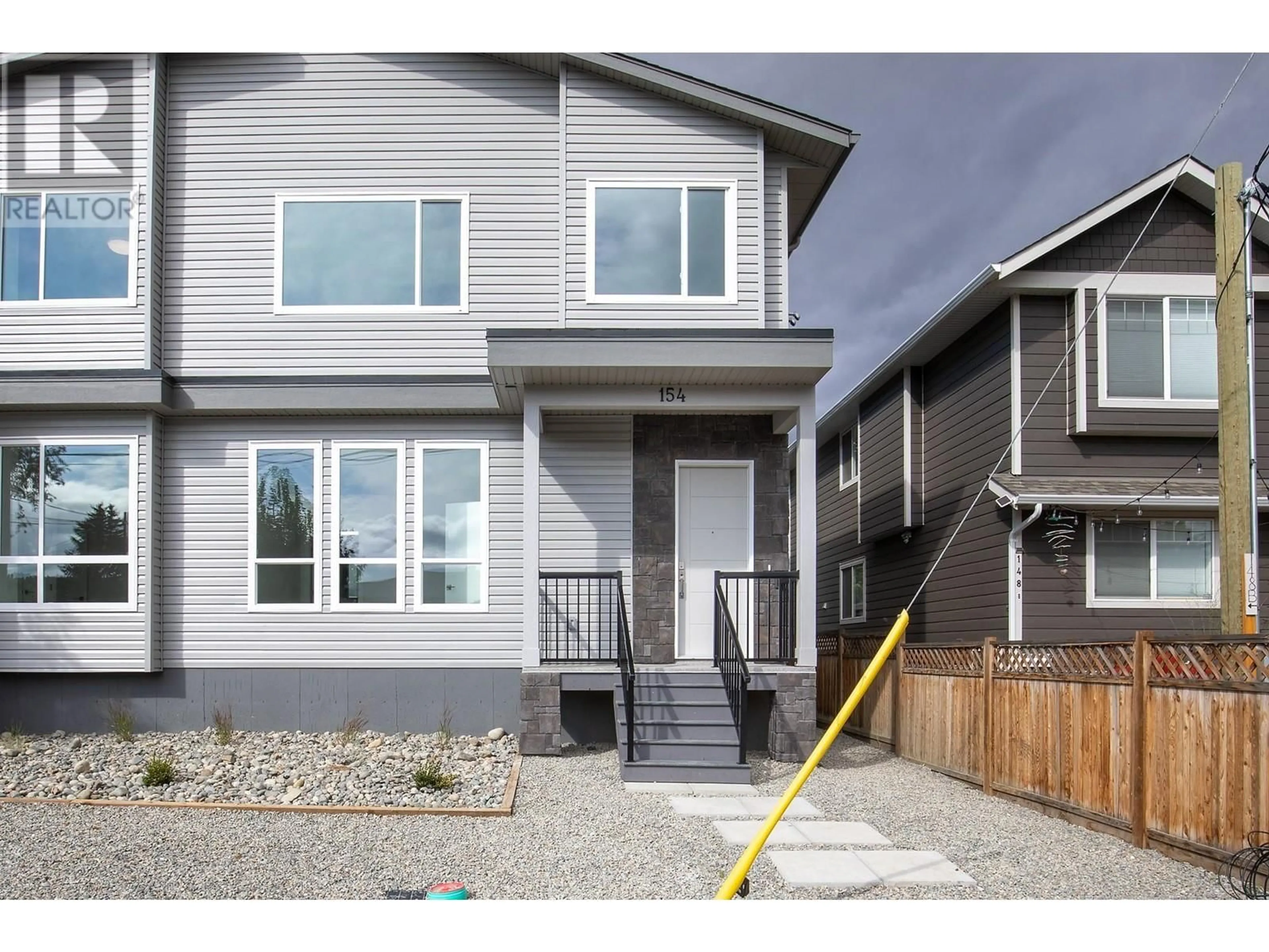 Frontside or backside of a home, the fenced backyard for 154 WILLIAMS Street, Kamloops British Columbia V2B3Z6