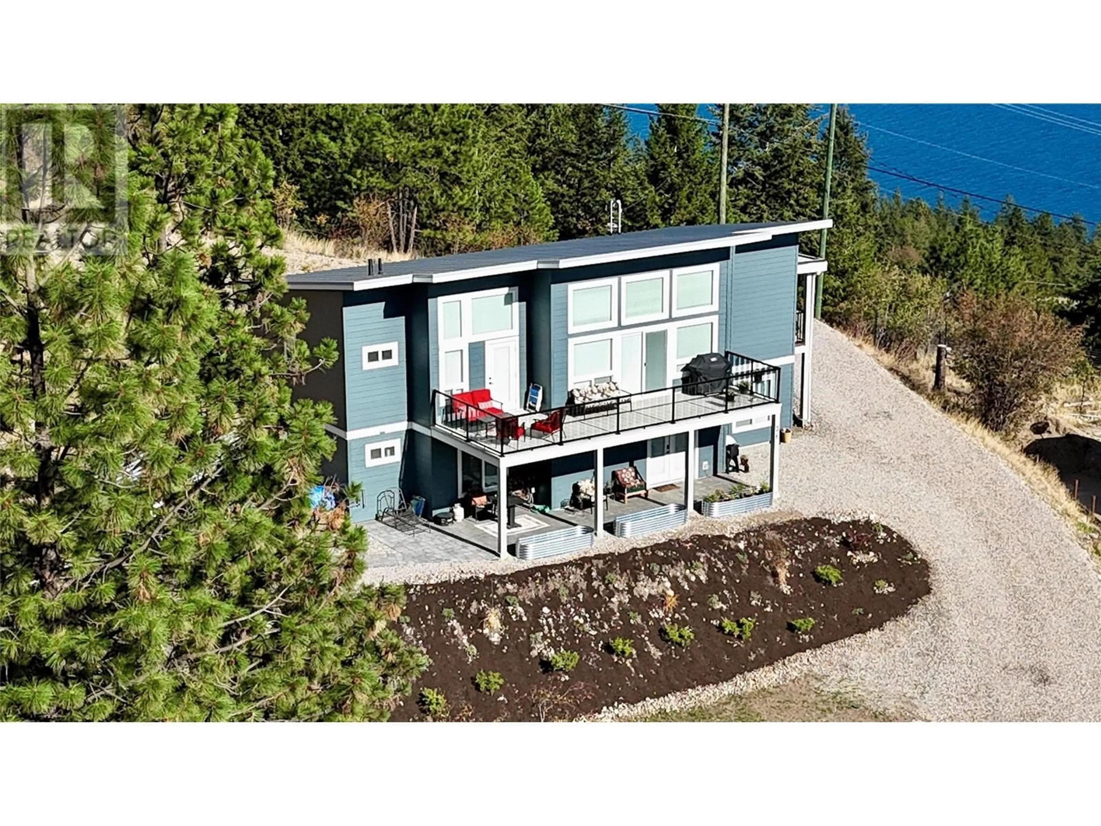 Home with vinyl exterior material for 36 Spruce Drive, Vernon British Columbia V1H2V4