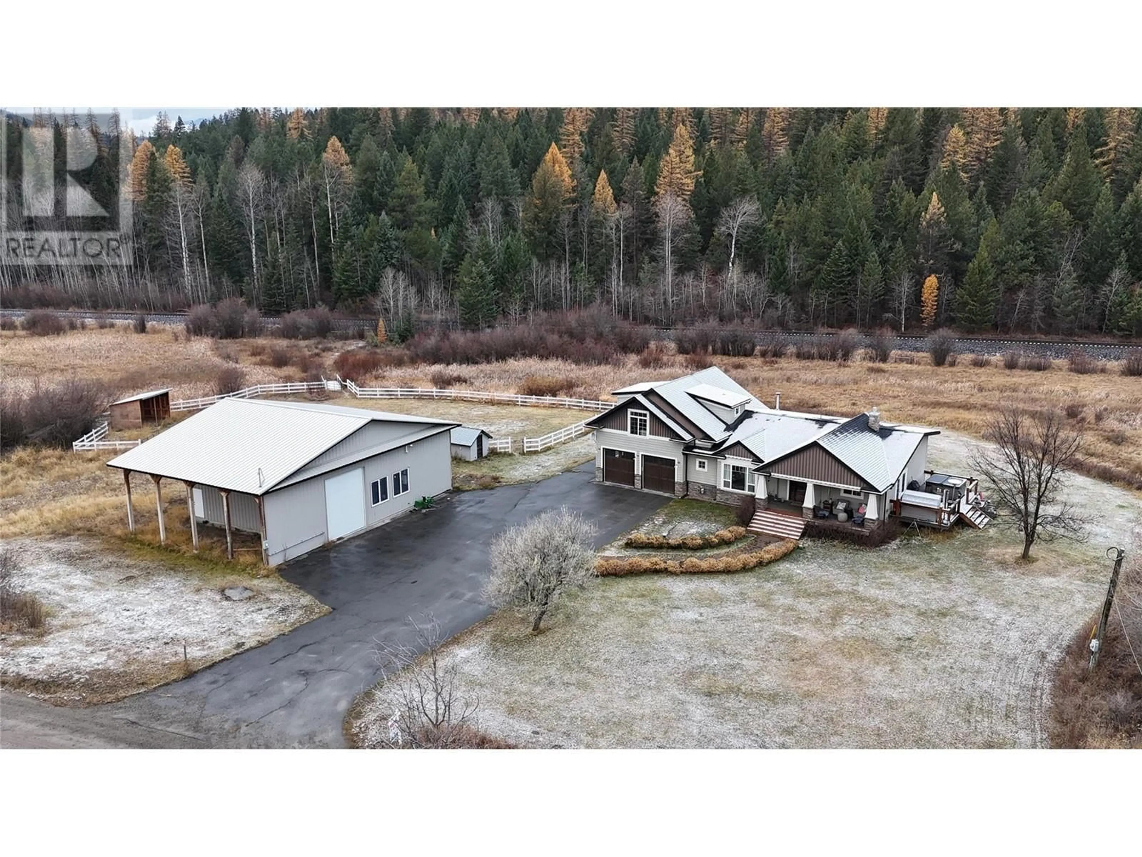 A pic from outside/outdoor area/front of a property/back of a property/a pic from drone, mountain view for 5533 TWIN LAKES ROAD, Cranbrook British Columbia V1C6X1