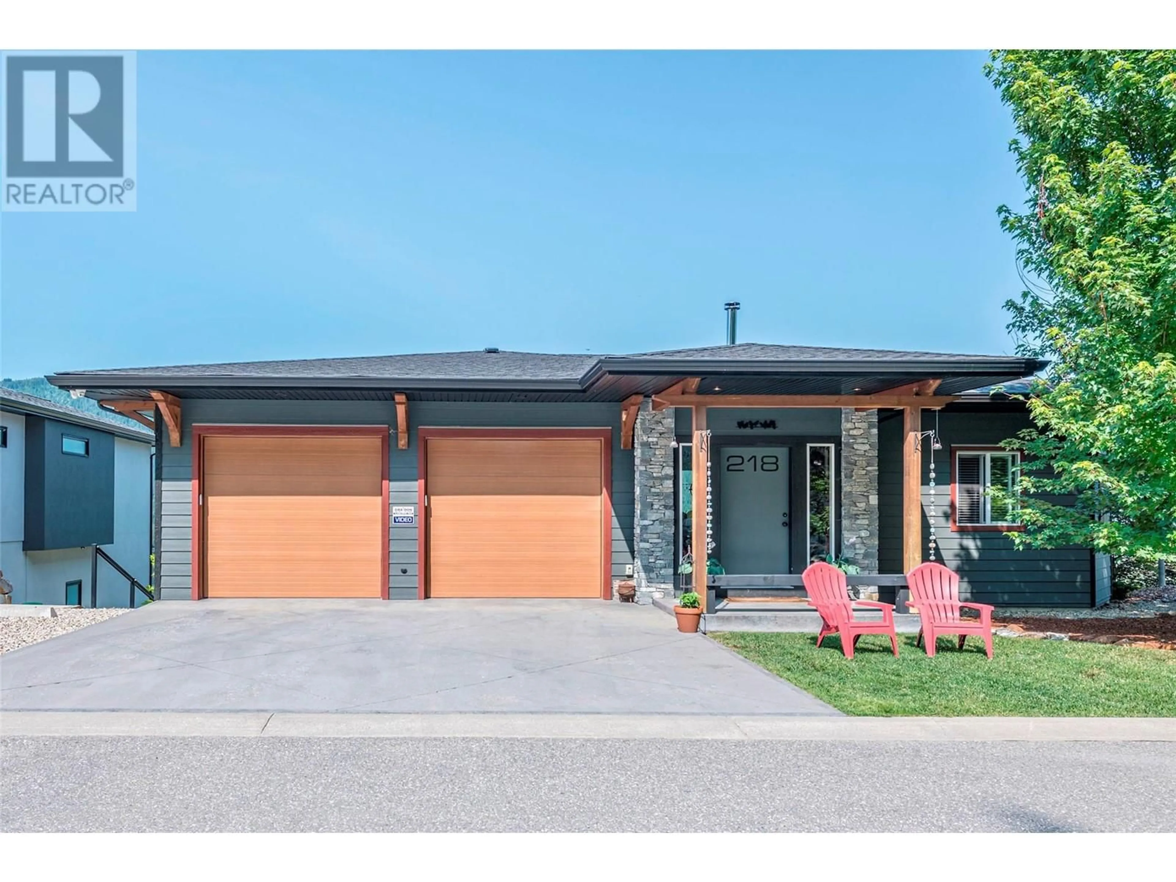 Home with brick exterior material, street for 218 SUNSET DRIVE, Sicamous British Columbia V0E2V1