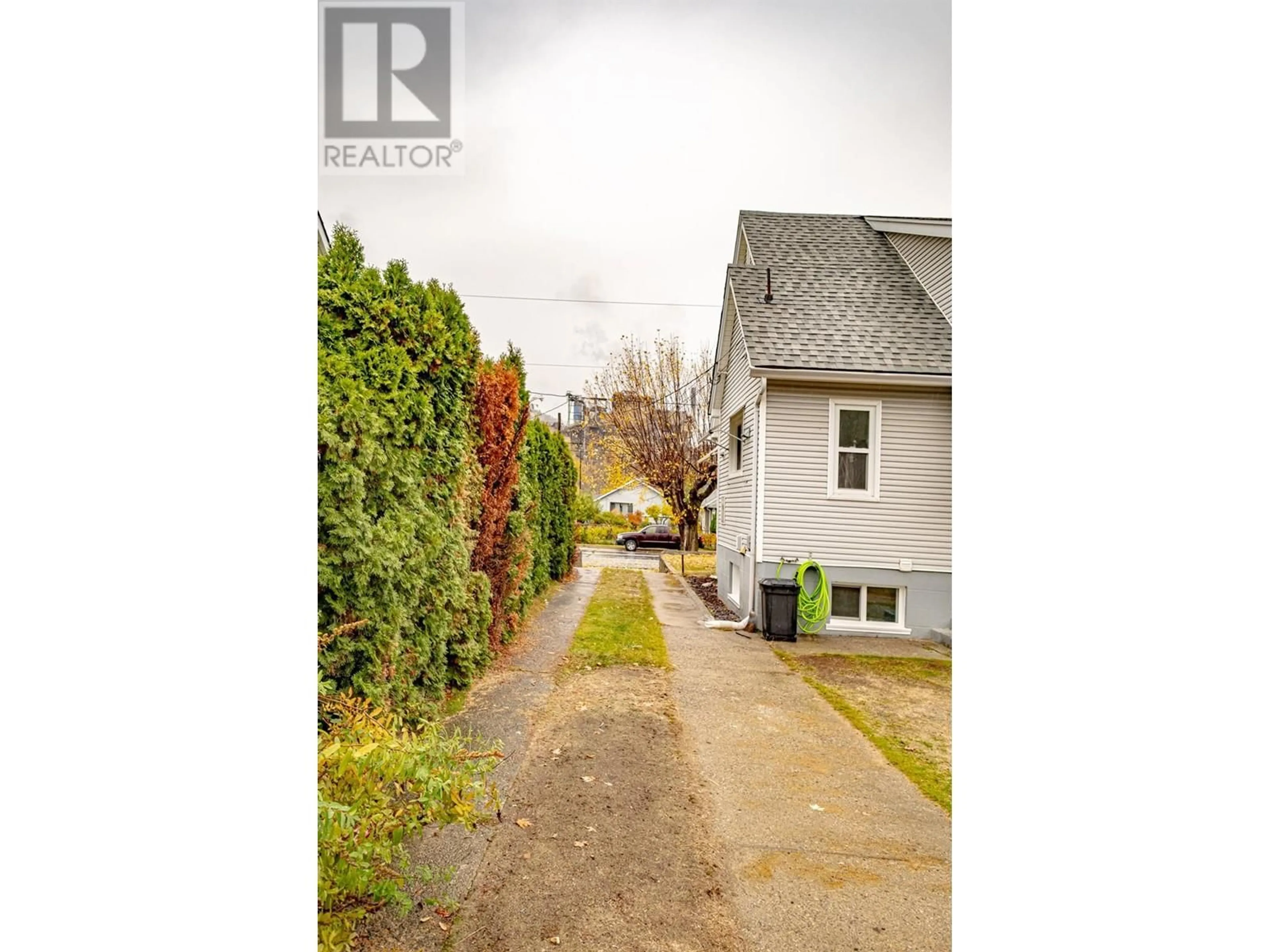 A pic from outside/outdoor area/front of a property/back of a property/a pic from drone, street for 1237 COLUMBIA AVENUE, Trail British Columbia V1R1J3
