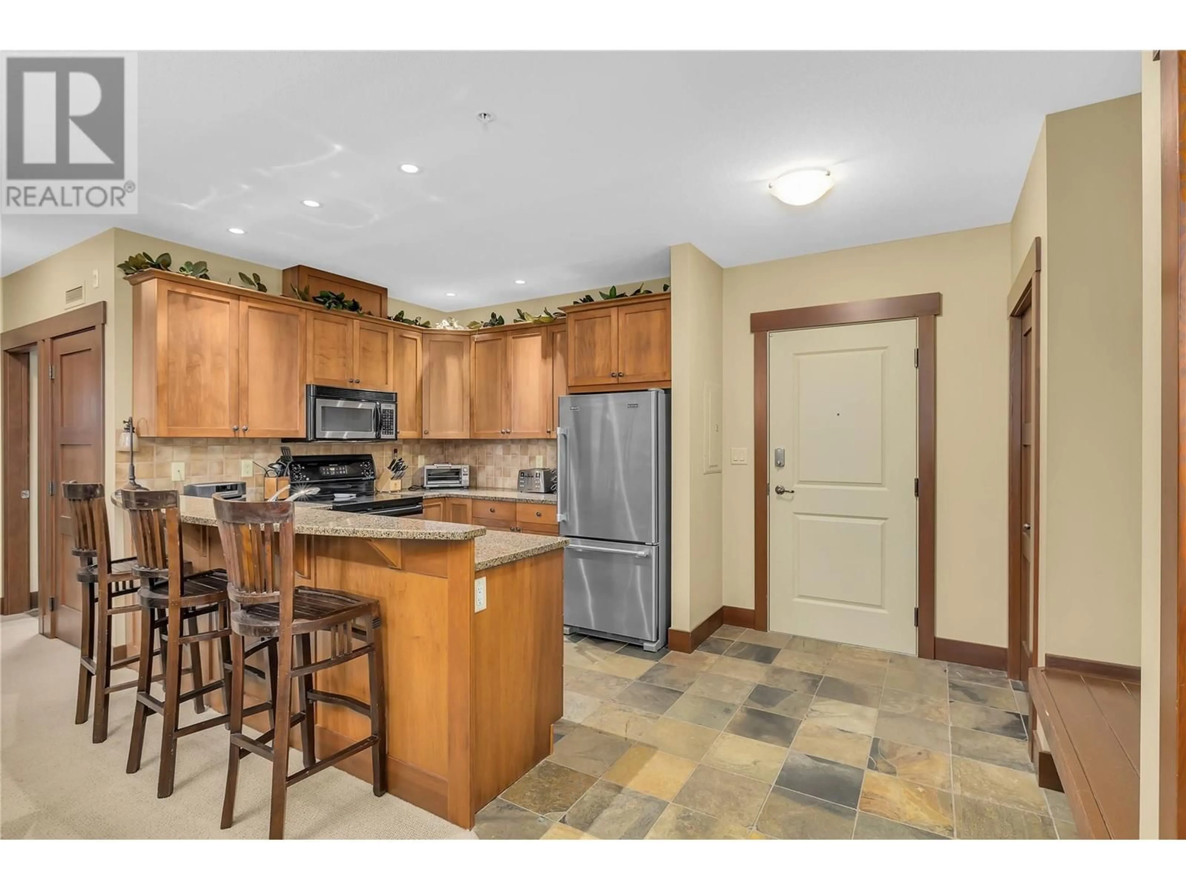 Open concept kitchen, ceramic/tile floor for 307 - 5259 BIG WHITE ROAD, Big White British Columbia V1P1P3