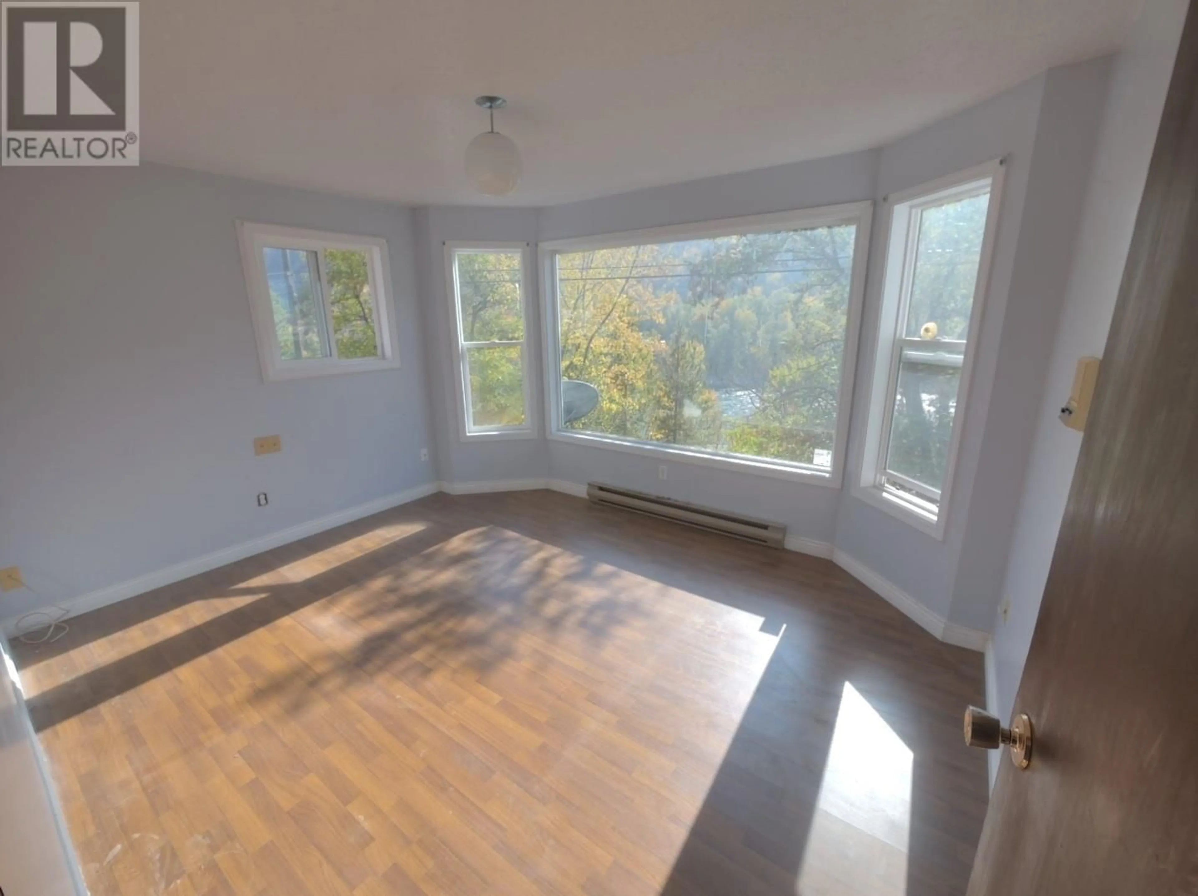 A pic of a room, wood floors for 1610 McBride Street, Trail British Columbia V1R2Z6