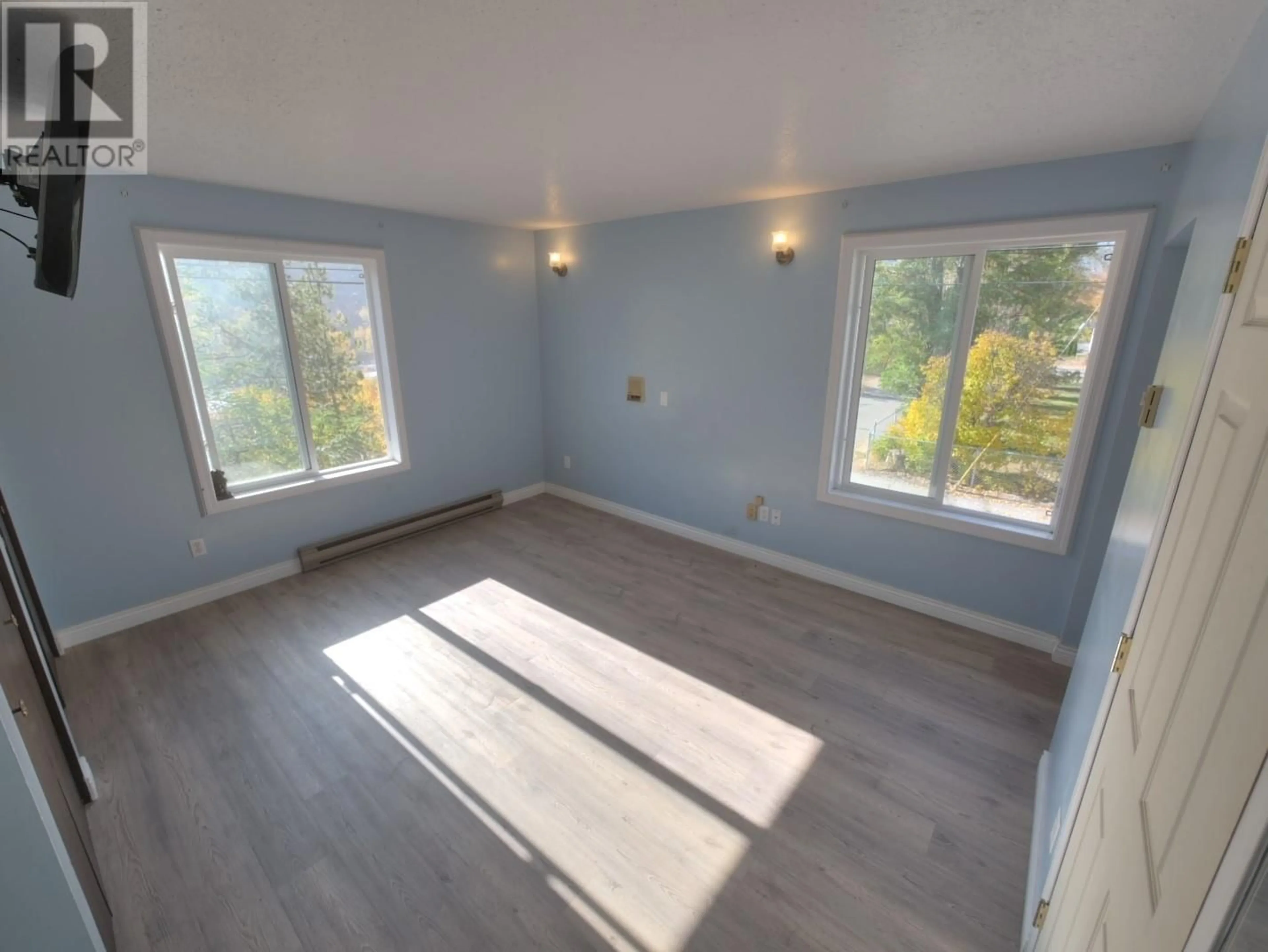 A pic of a room, wood floors for 1610 McBride Street, Trail British Columbia V1R2Z6