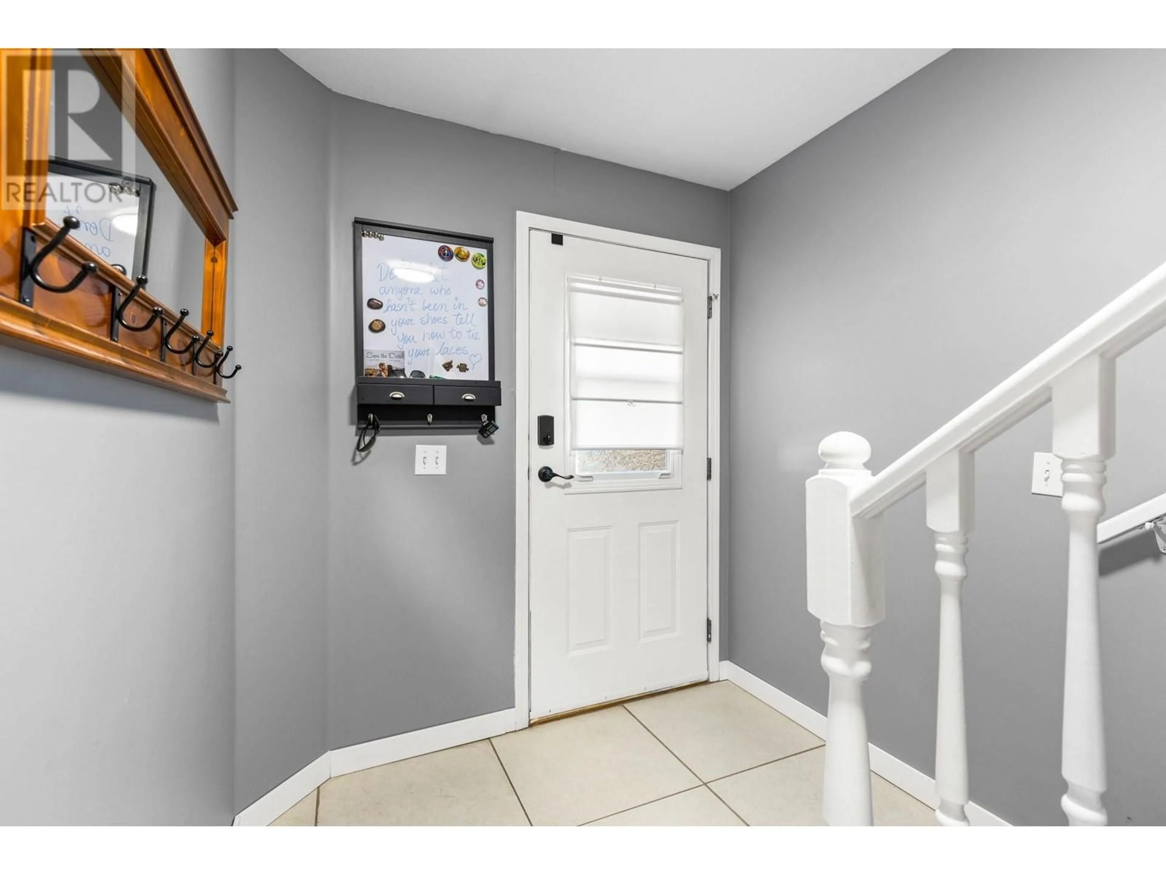 Indoor entryway, wood floors for 222 Biggar Road, Kelowna British Columbia V1V1S4