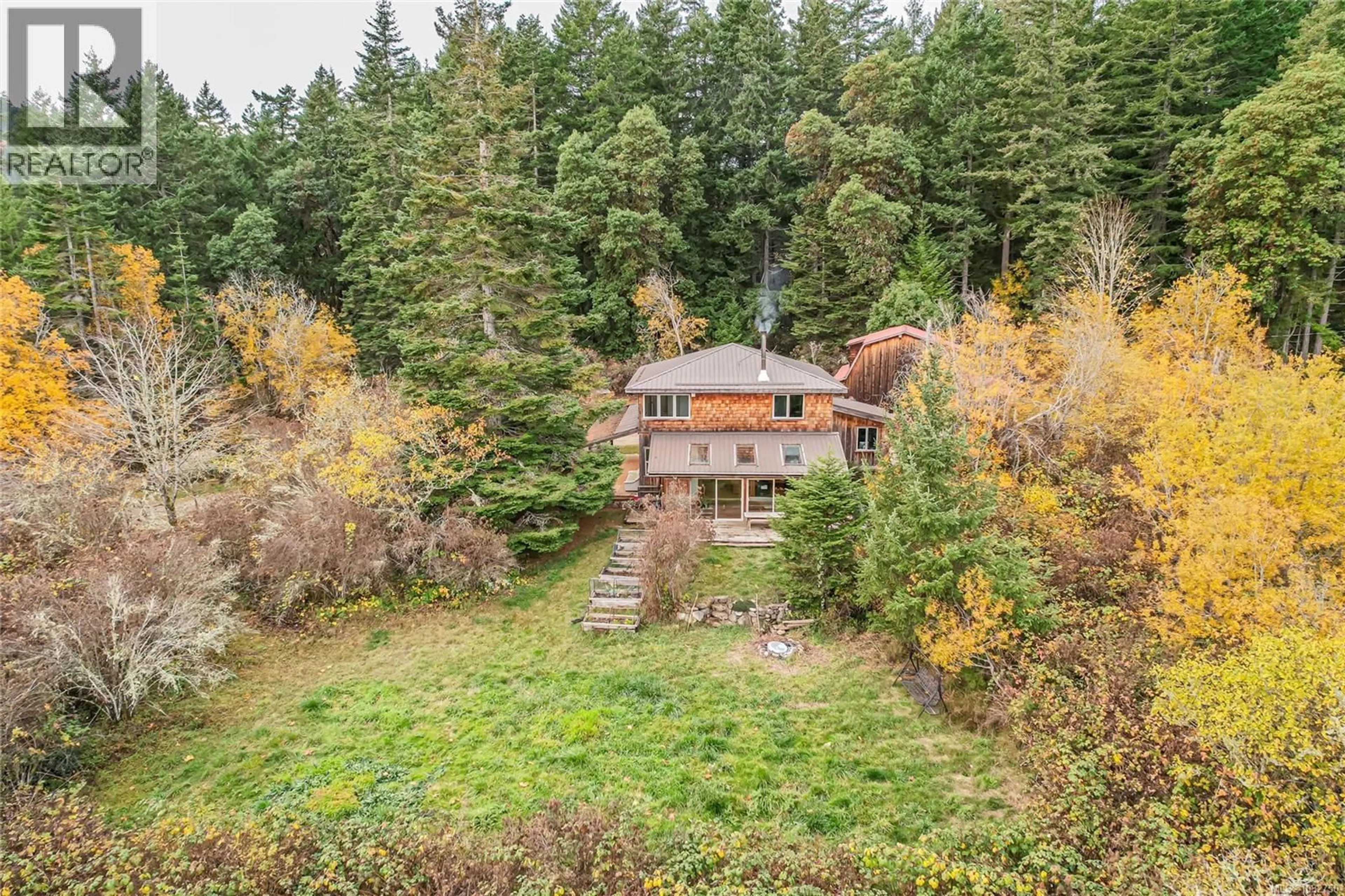 A pic from outside/outdoor area/front of a property/back of a property/a pic from drone, forest/trees view for 210 EPRON ROAD, Salt Spring British Columbia V8K1C7