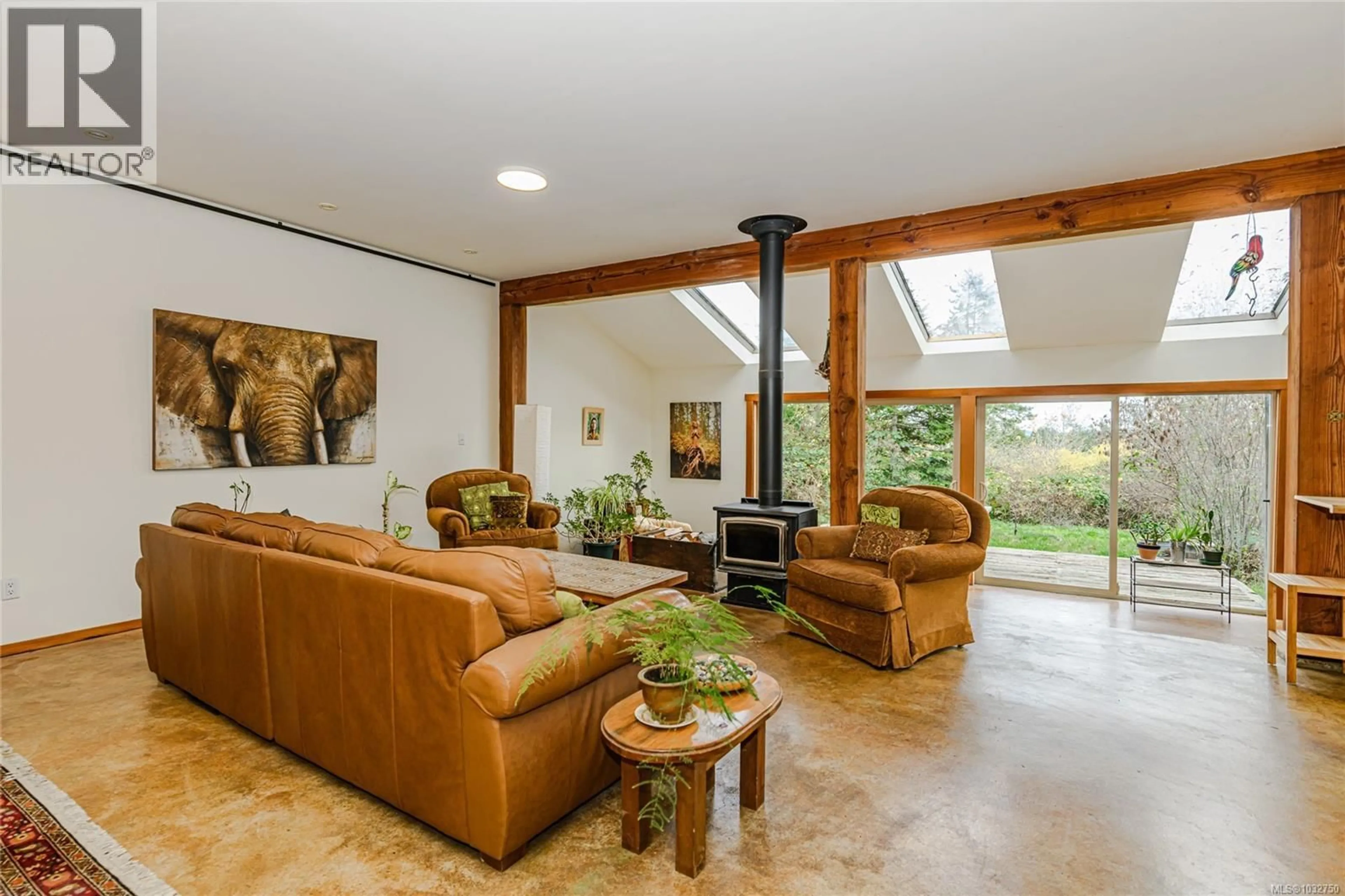 Living room with furniture, ceramic/tile floor for 210 EPRON ROAD, Salt Spring British Columbia V8K1C7