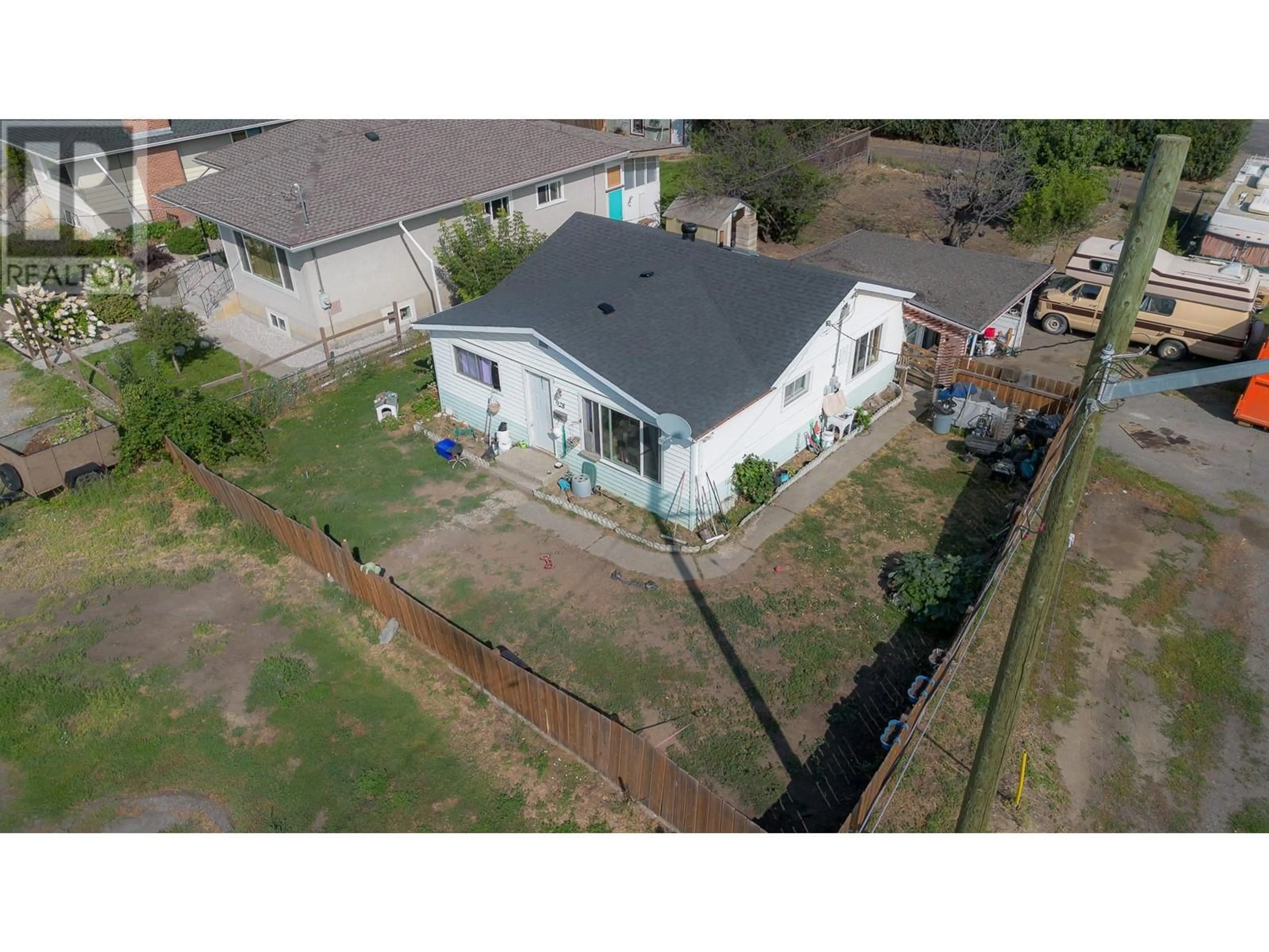 Frontside or backside of a home, the fenced backyard for 928 SHERBROOKE Avenue, Kamloops British Columbia V2B1W2