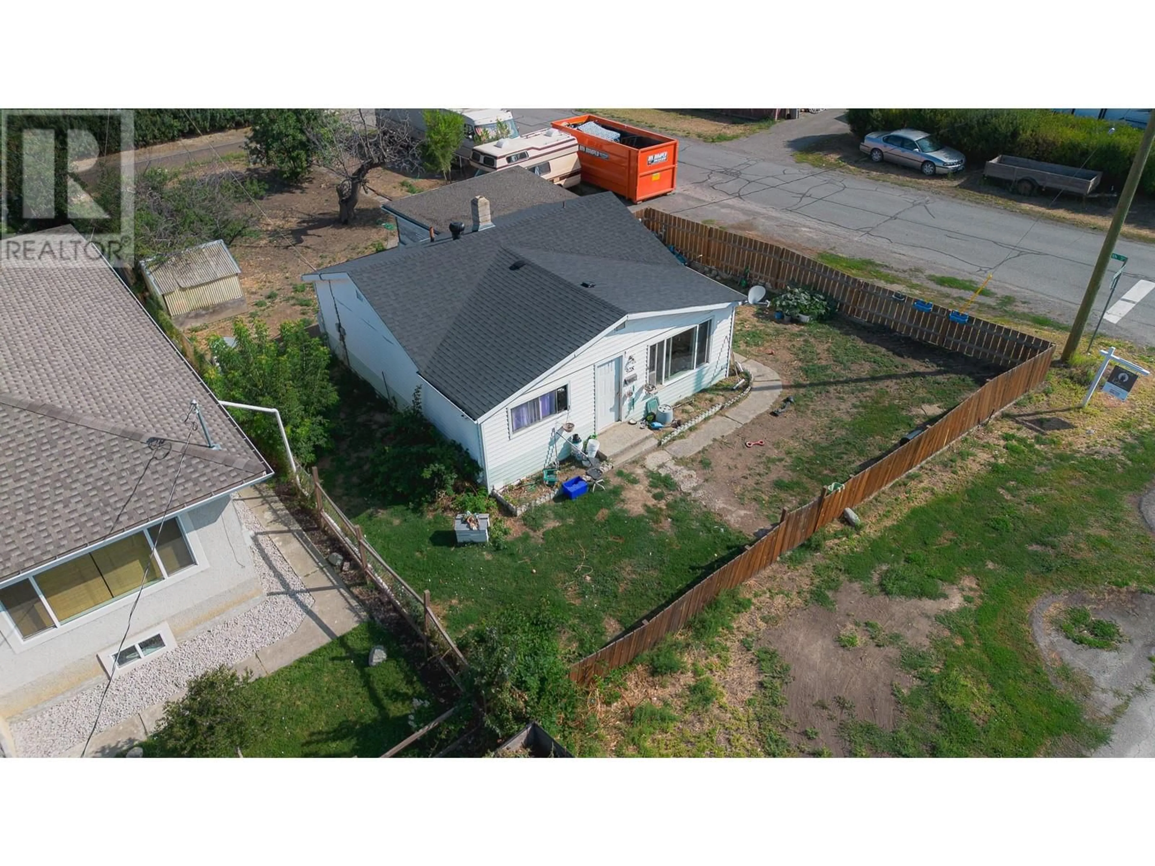 Frontside or backside of a home, the fenced backyard for 928 SHERBROOKE Avenue, Kamloops British Columbia V2B1W2