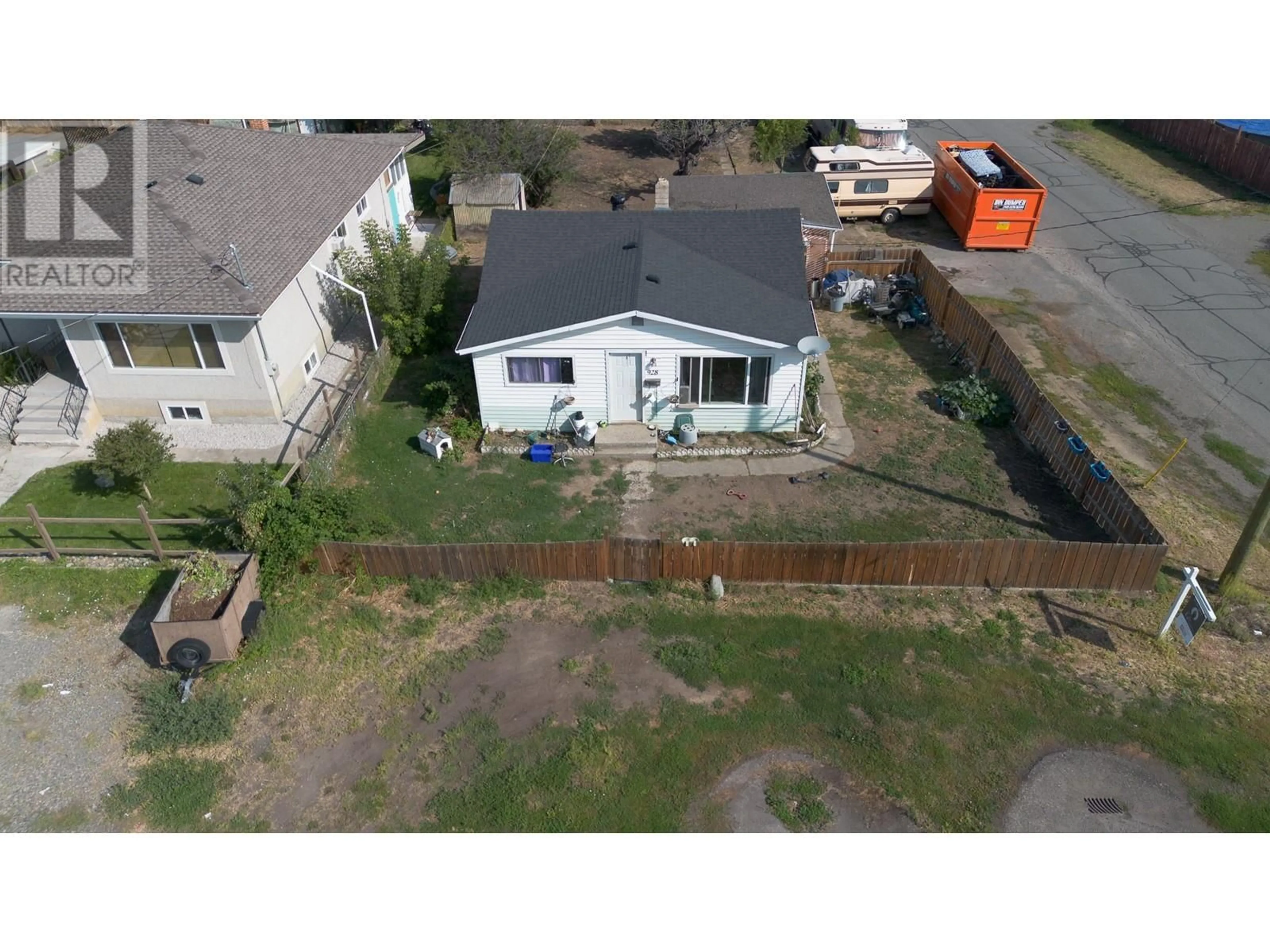 Frontside or backside of a home, the fenced backyard for 928 SHERBROOKE Avenue, Kamloops British Columbia V2B1W2