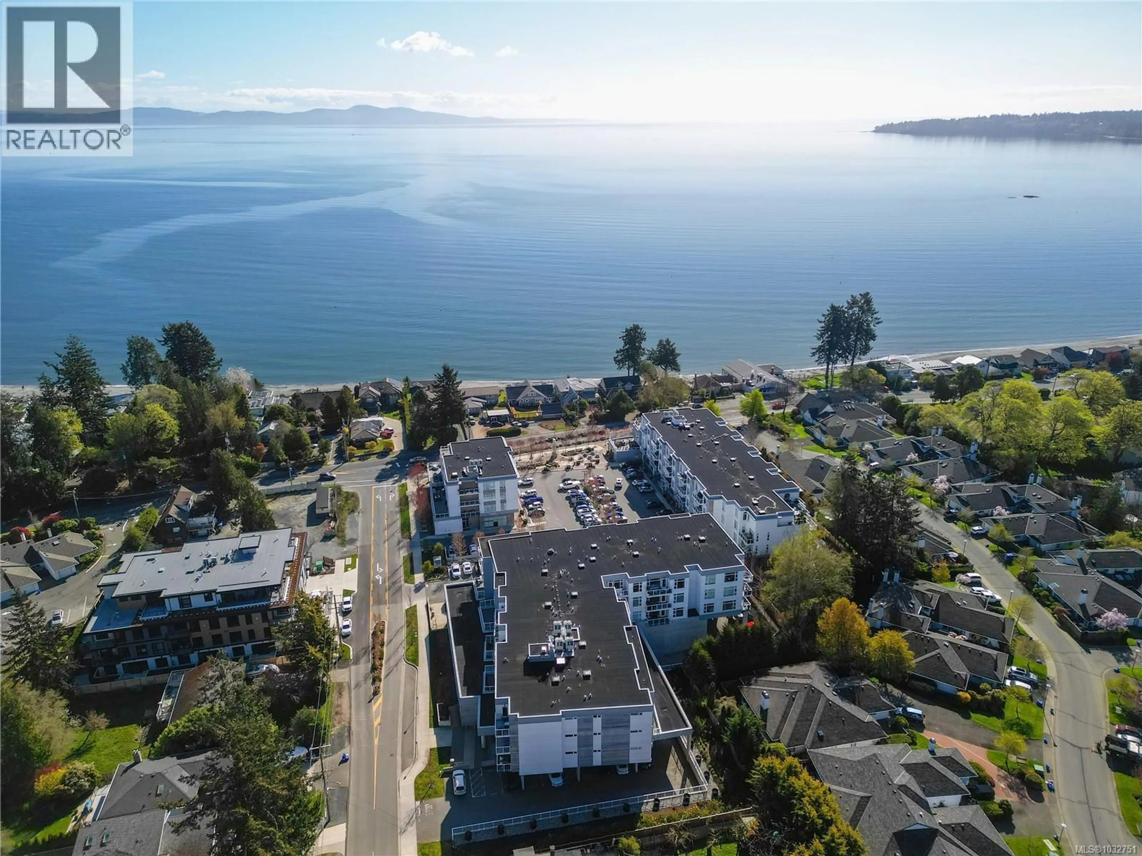 A pic from outside/outdoor area/front of a property/back of a property/a pic from drone, water/lake/river/ocean view for 214 - 5120 CORDOVA BAY ROAD, Saanich British Columbia V8Y2K5