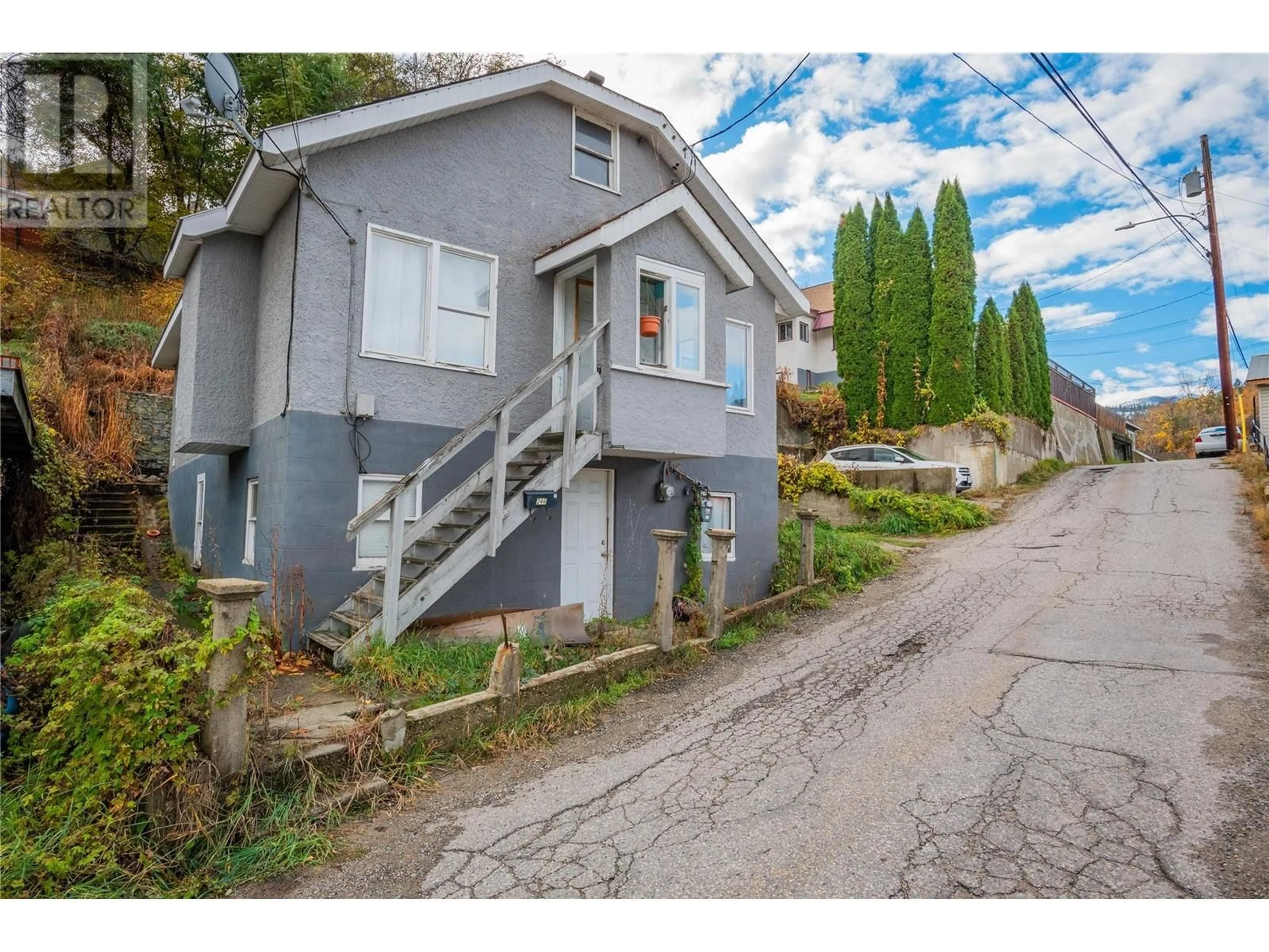 Frontside or backside of a home, the street view for 246 ESLING Street, Trail British Columbia V1R3M2