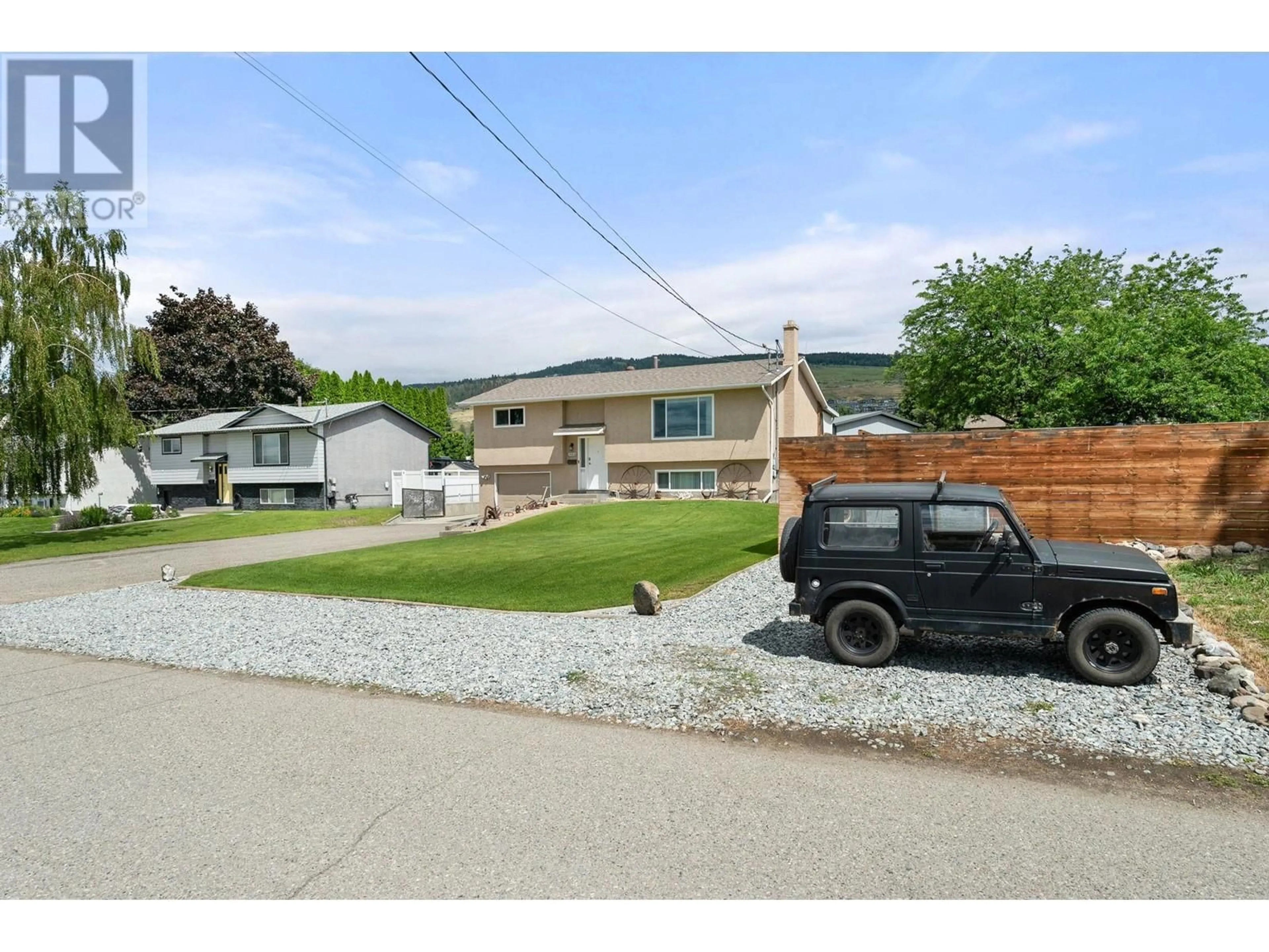 Frontside or backside of a home, the street view for 3641 Weston Road, Kelowna British Columbia V1X6S9