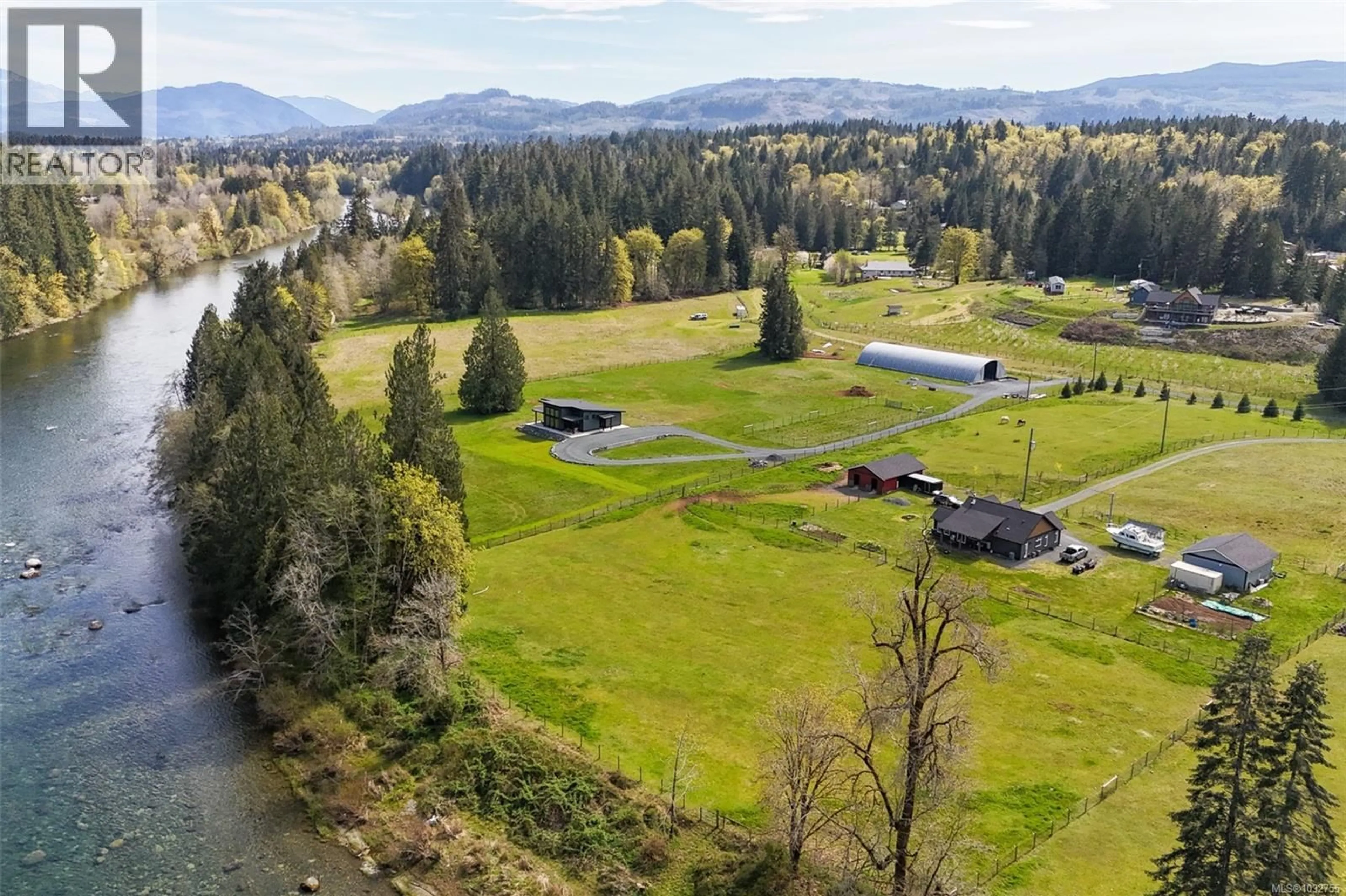 A pic from outside/outdoor area/front of a property/back of a property/a pic from drone, water/lake/river/ocean view for 6593 VISTA ROAD, Port Alberni British Columbia V9Y9E9