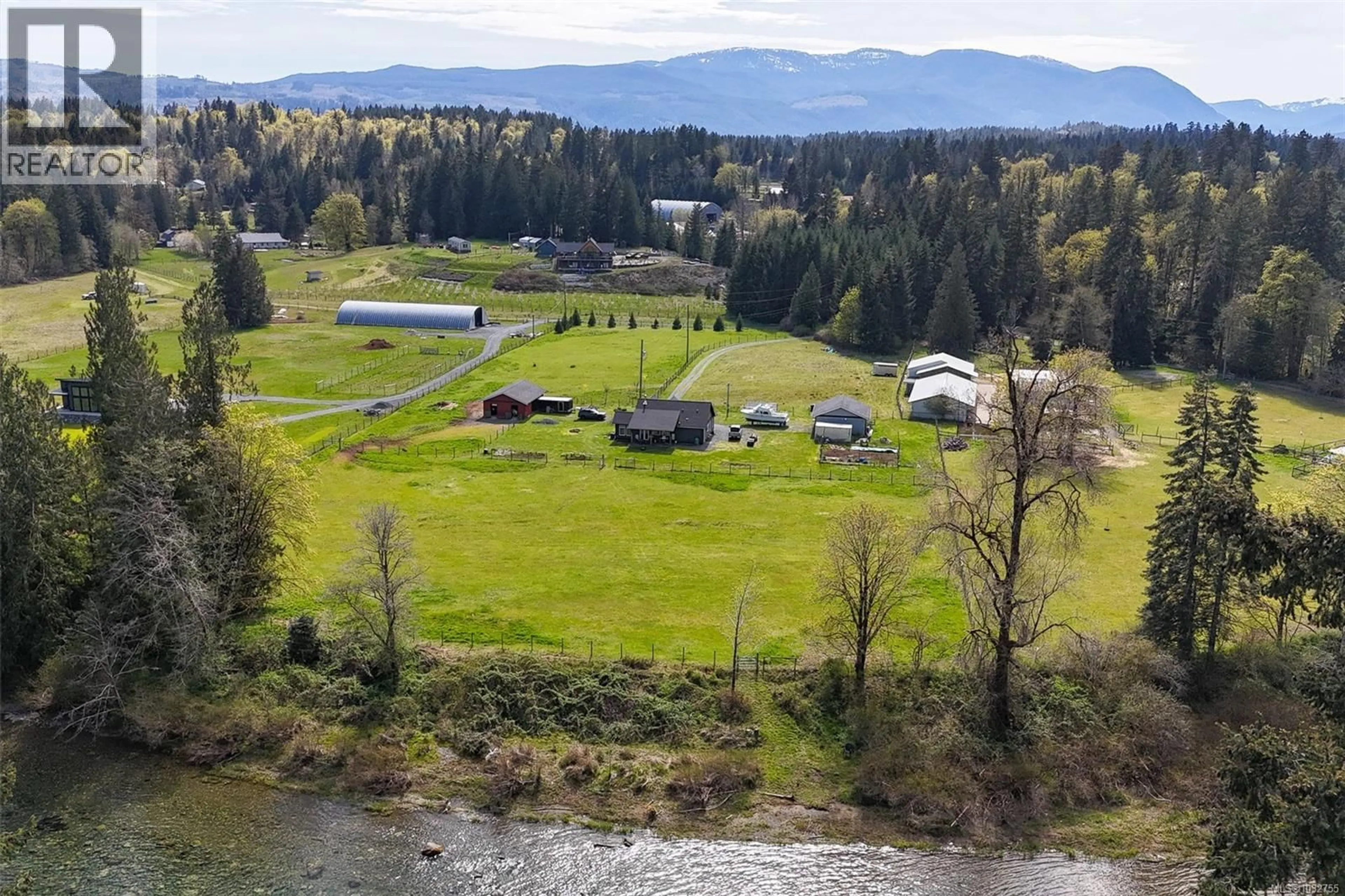 A pic from outside/outdoor area/front of a property/back of a property/a pic from drone, water/lake/river/ocean view for 6593 VISTA ROAD, Port Alberni British Columbia V9Y9E9