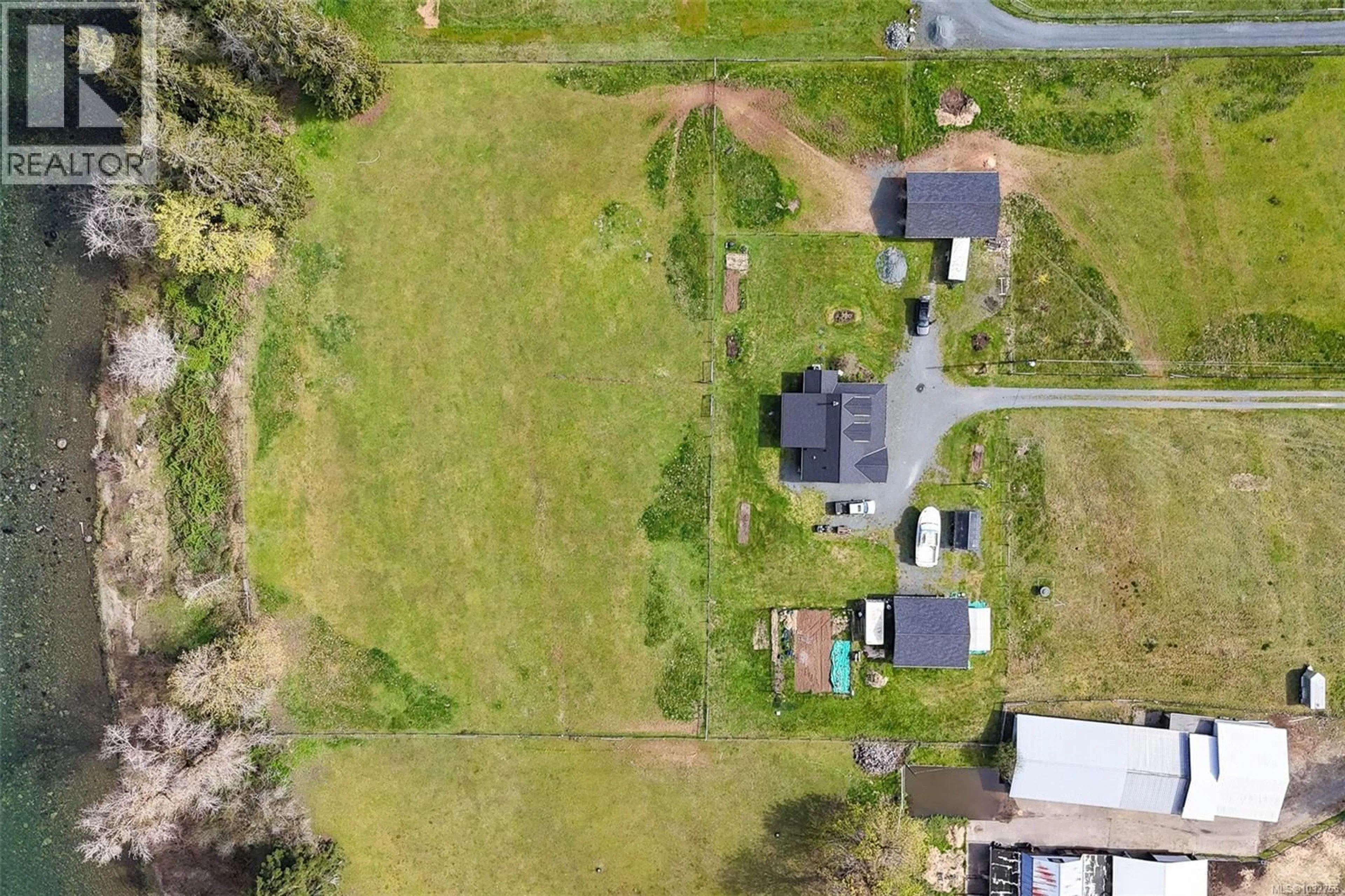 A pic from outside/outdoor area/front of a property/back of a property/a pic from drone, street for 6593 VISTA ROAD, Port Alberni British Columbia V9Y9E9