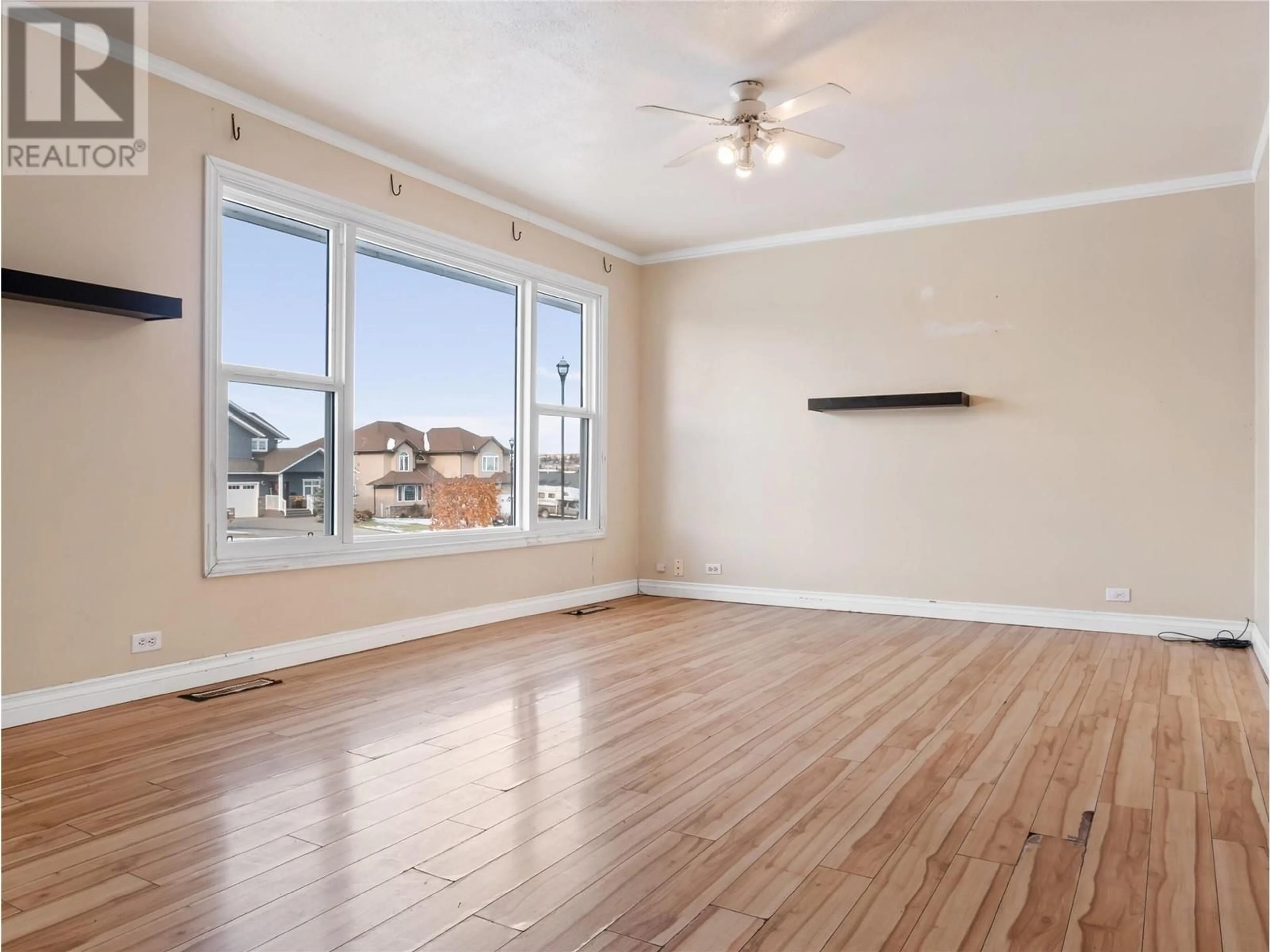 A pic of a room, wood floors for 10929 Turgeon Drive, Dawson Creek British Columbia V1G2W9