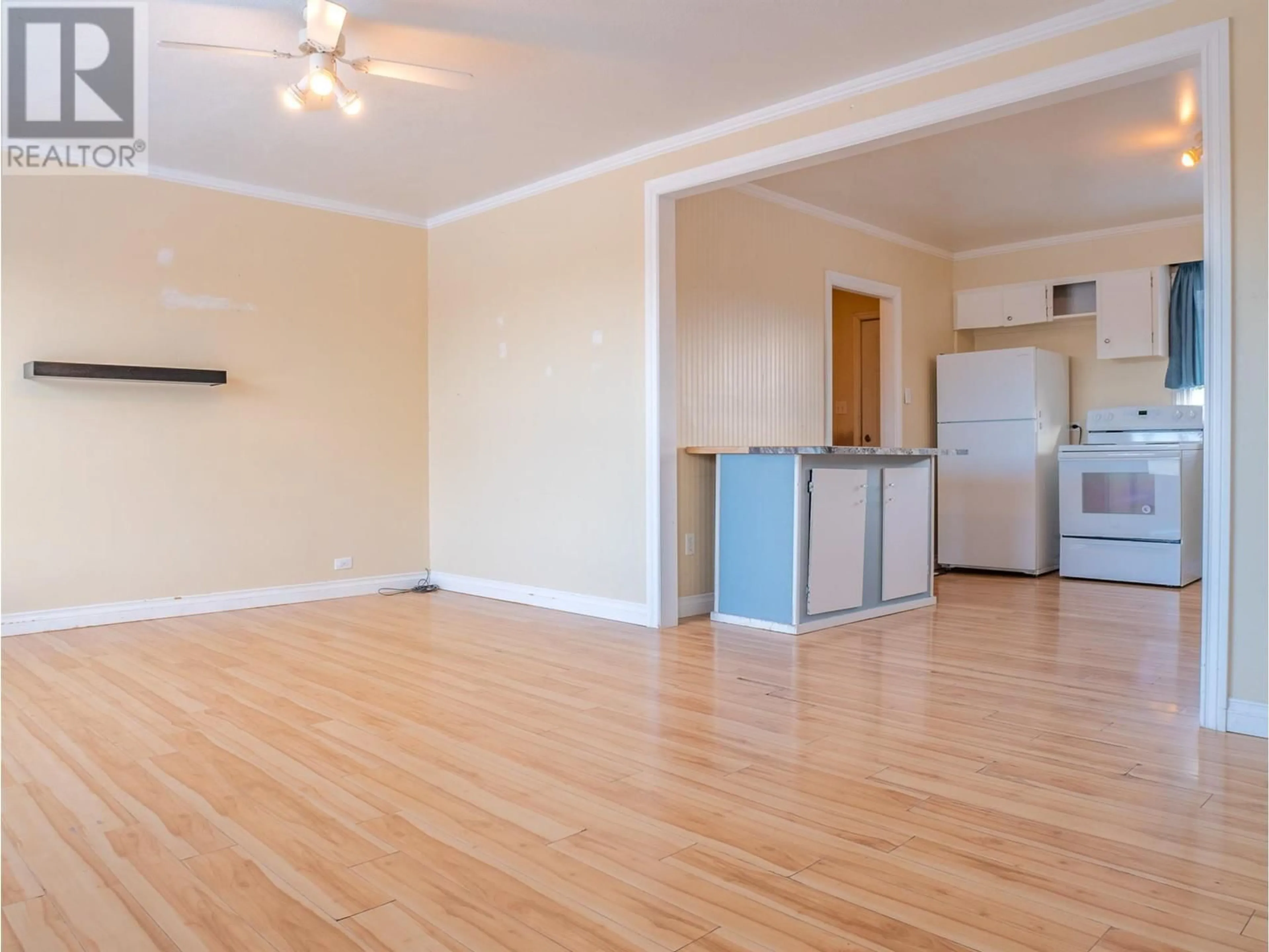 A pic of a room, wood floors for 10929 Turgeon Drive, Dawson Creek British Columbia V1G2W9