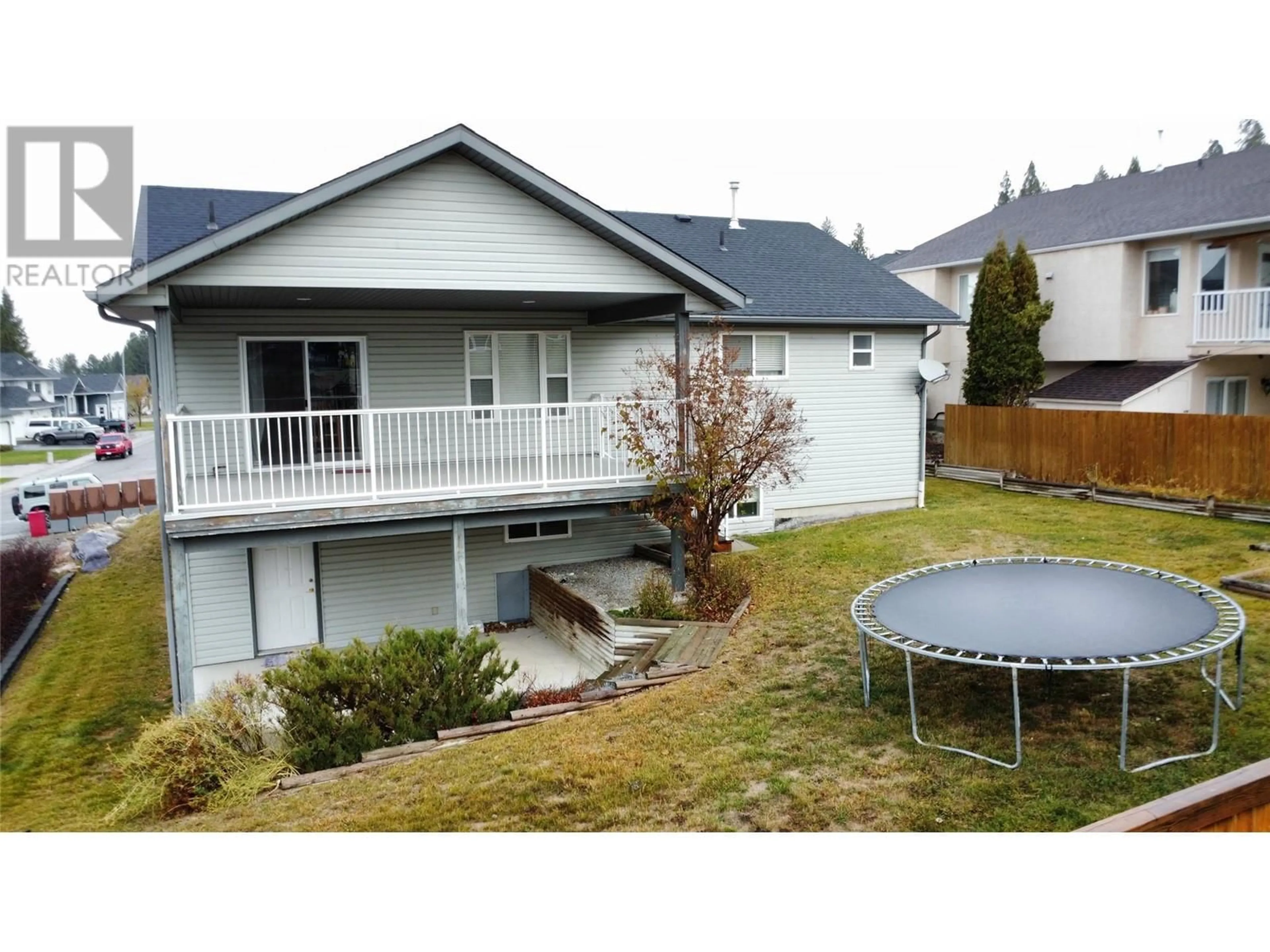 Frontside or backside of a home, the fenced backyard for 3301 MT FISHER  N Drive, Cranbrook British Columbia V1C6N6