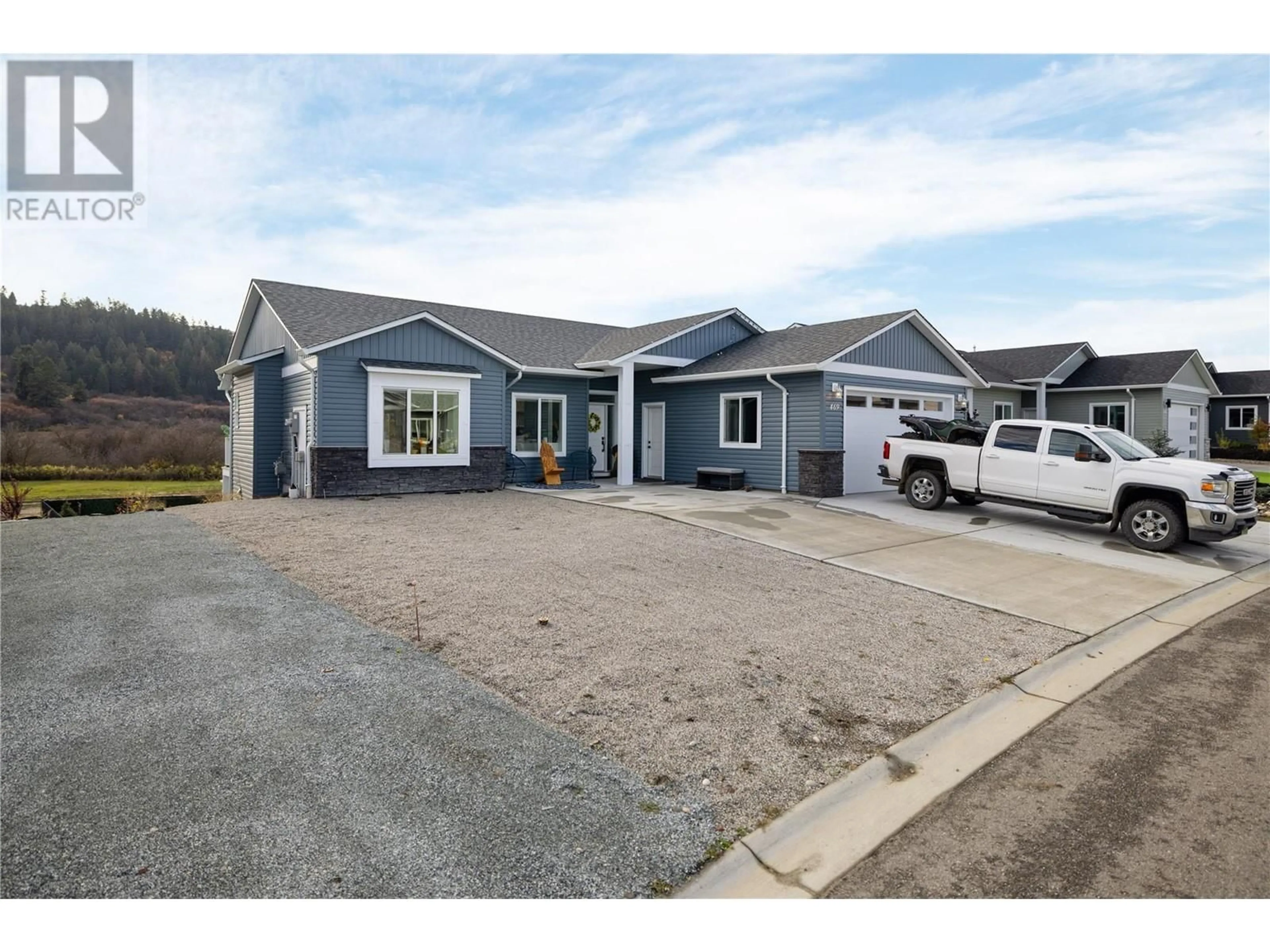 Home with vinyl exterior material, street for 469 4 STREET, Vernon British Columbia V1H1Z1